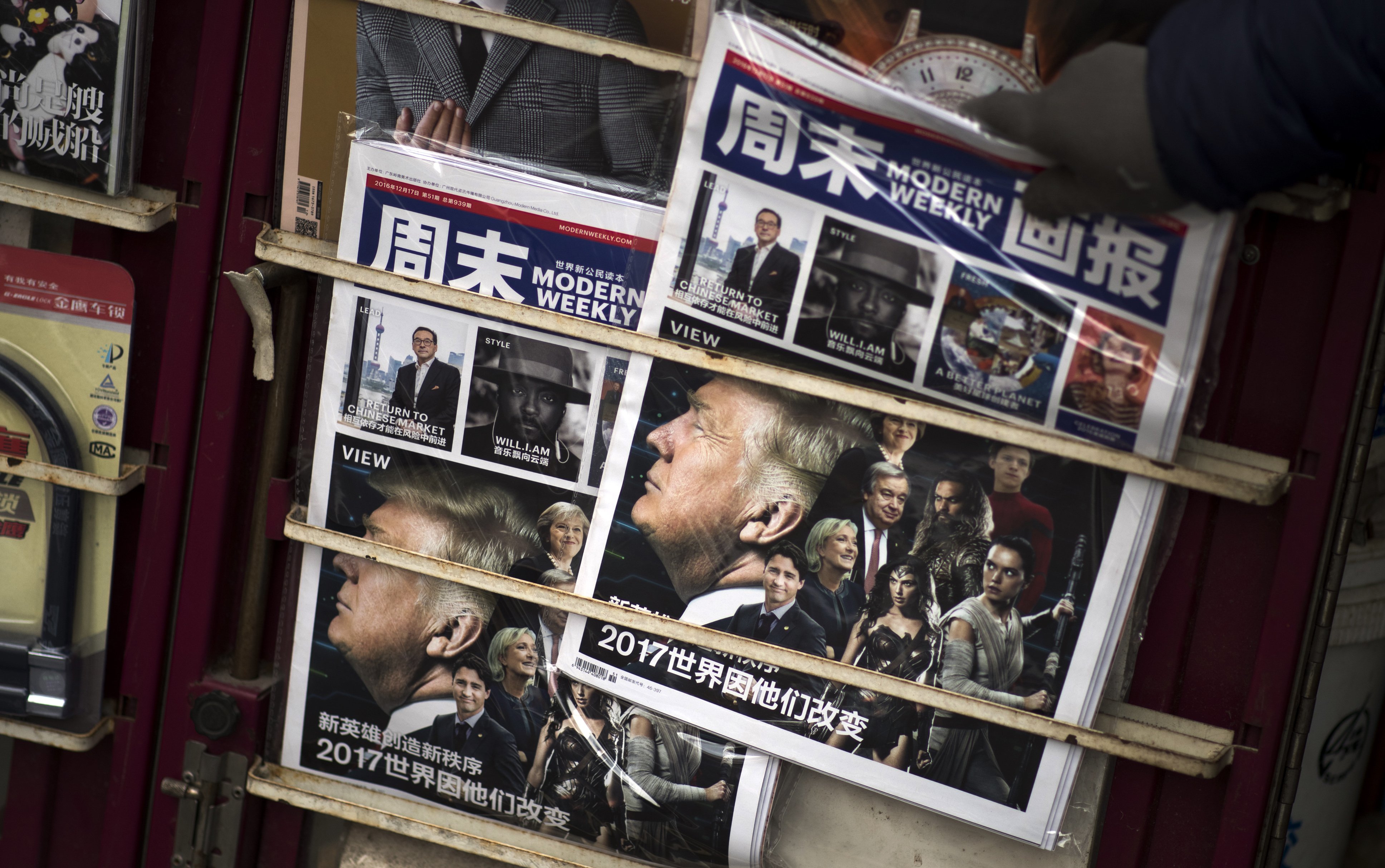 A Chinese magazine featuring US President-elect Donald Trump on the cover is seen at a newsstand in Shanghai on December 14, 2016. (Johannes Eisele—AFP/Getty Images)