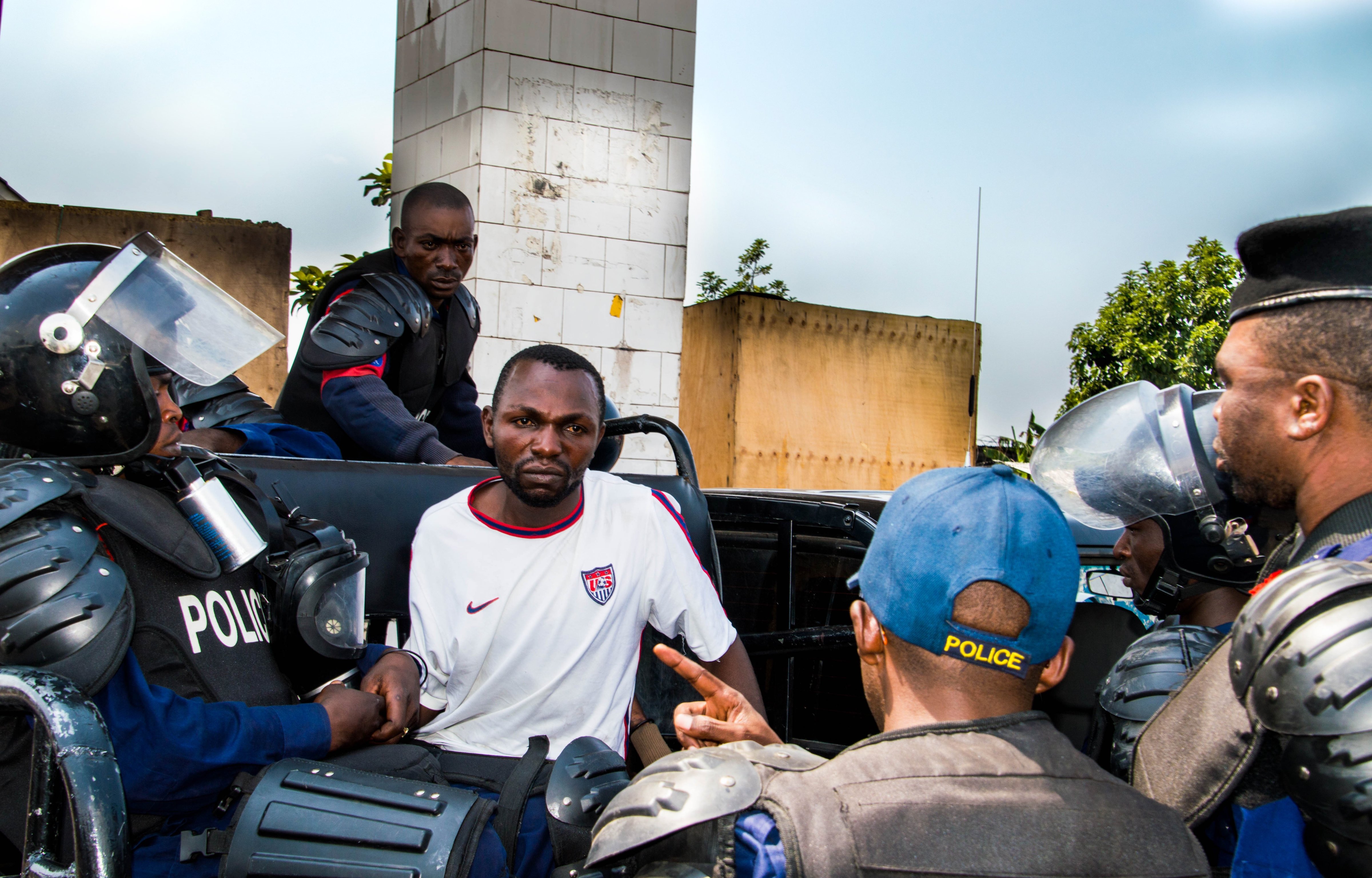 Security forces take into custody a protester as they take security measures in case people stage a protest after the postponing of the general and presidential elections due to financial problems in Goma, Democratic Republic of the Congo on December 19, 2016. (Jc Wenga—Anadolu Agency/Getty Images)