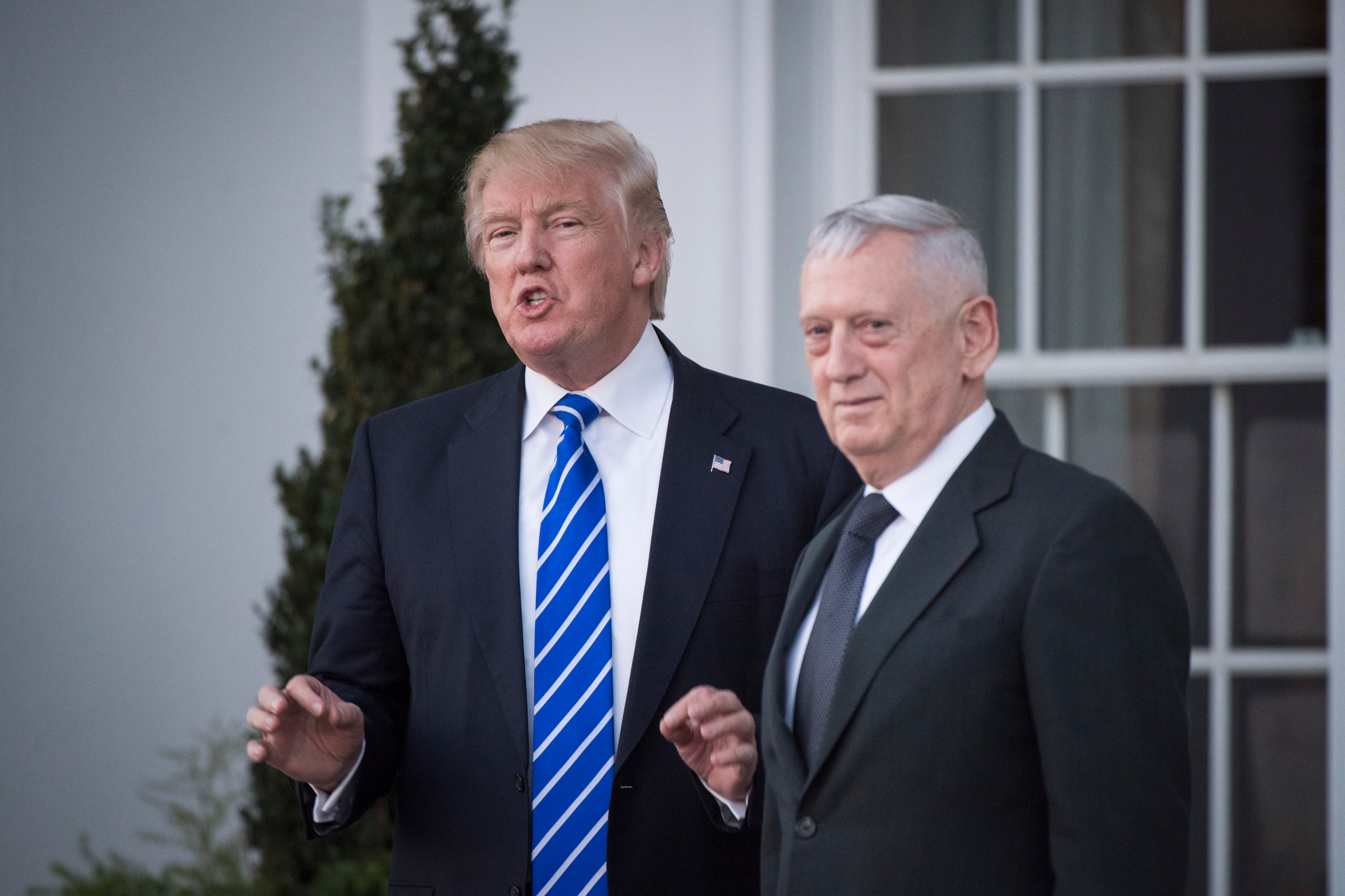 President-elect Donald Trump walks out with retired Marine Corps Gen. James Mattis at Trump National Golf Club Bedminster in Bedminster Township, N.J. on Nov. 19, 2016. (Jabin Botsford—The Washington Post/Getty Images)