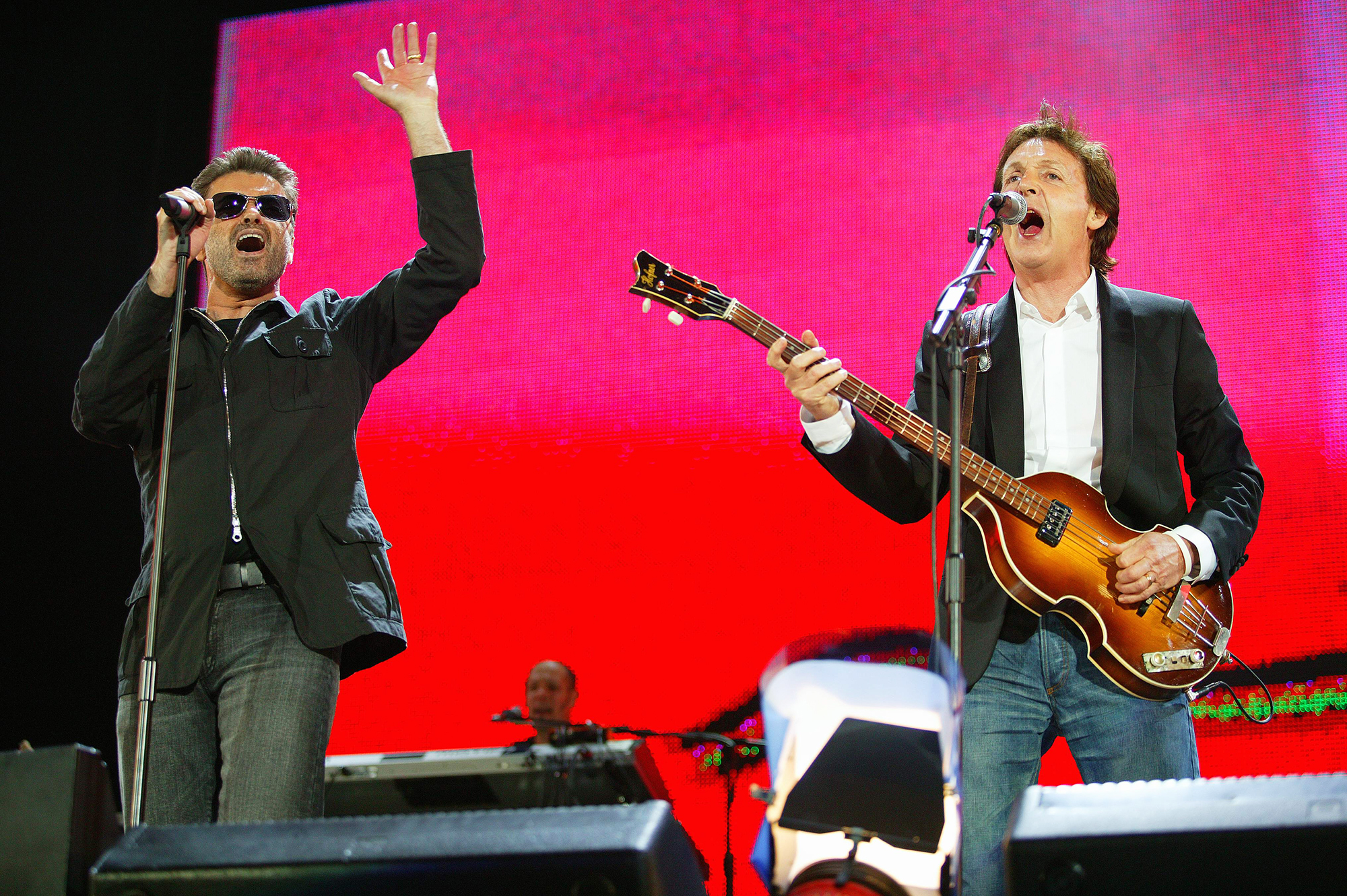 George Michael and Paul McCartney perform at Live 8 in London, on July 2, 2005.