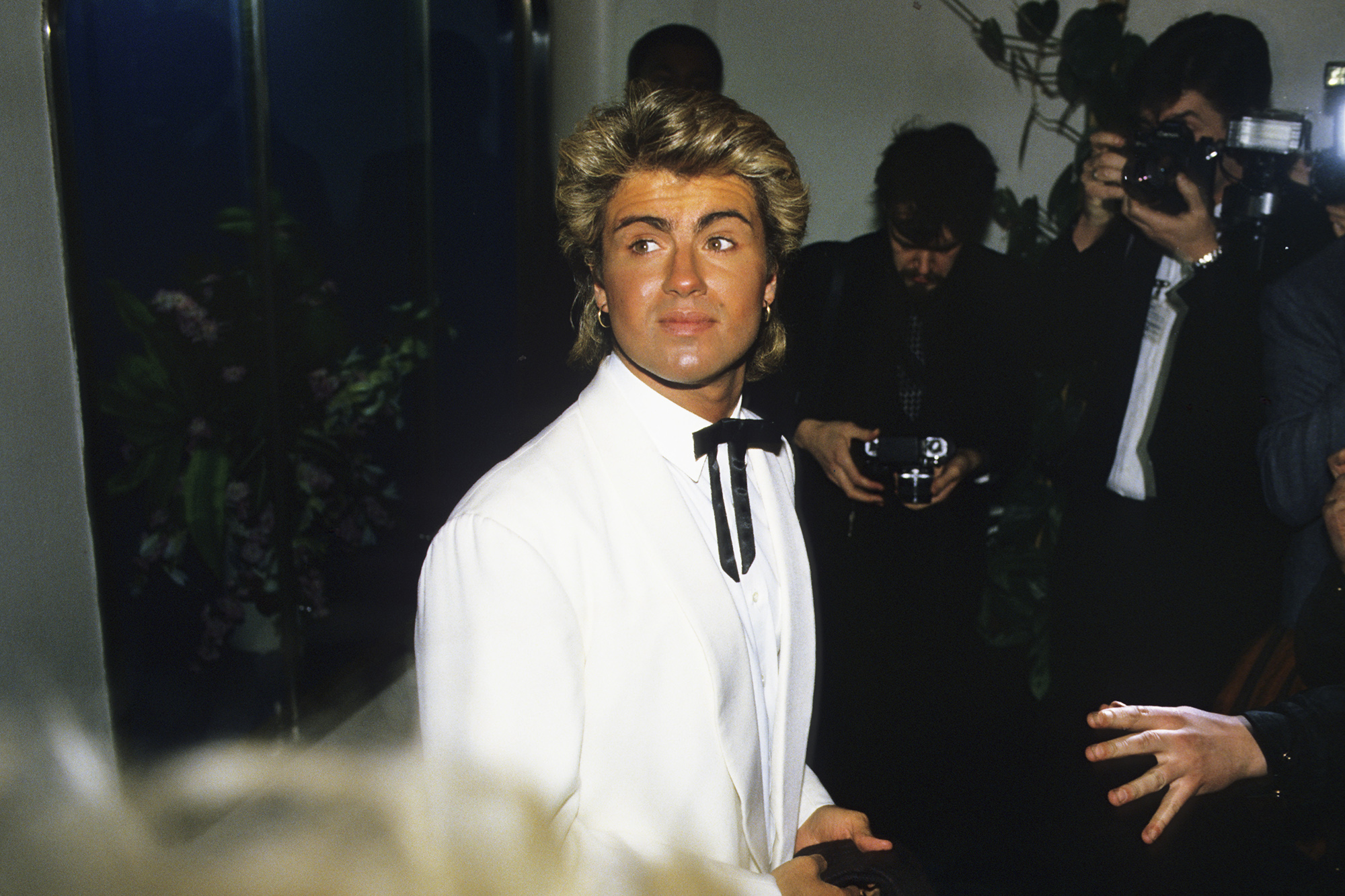 George Michael attends the BRIT Awards in London, on Feb. 11, 1985.