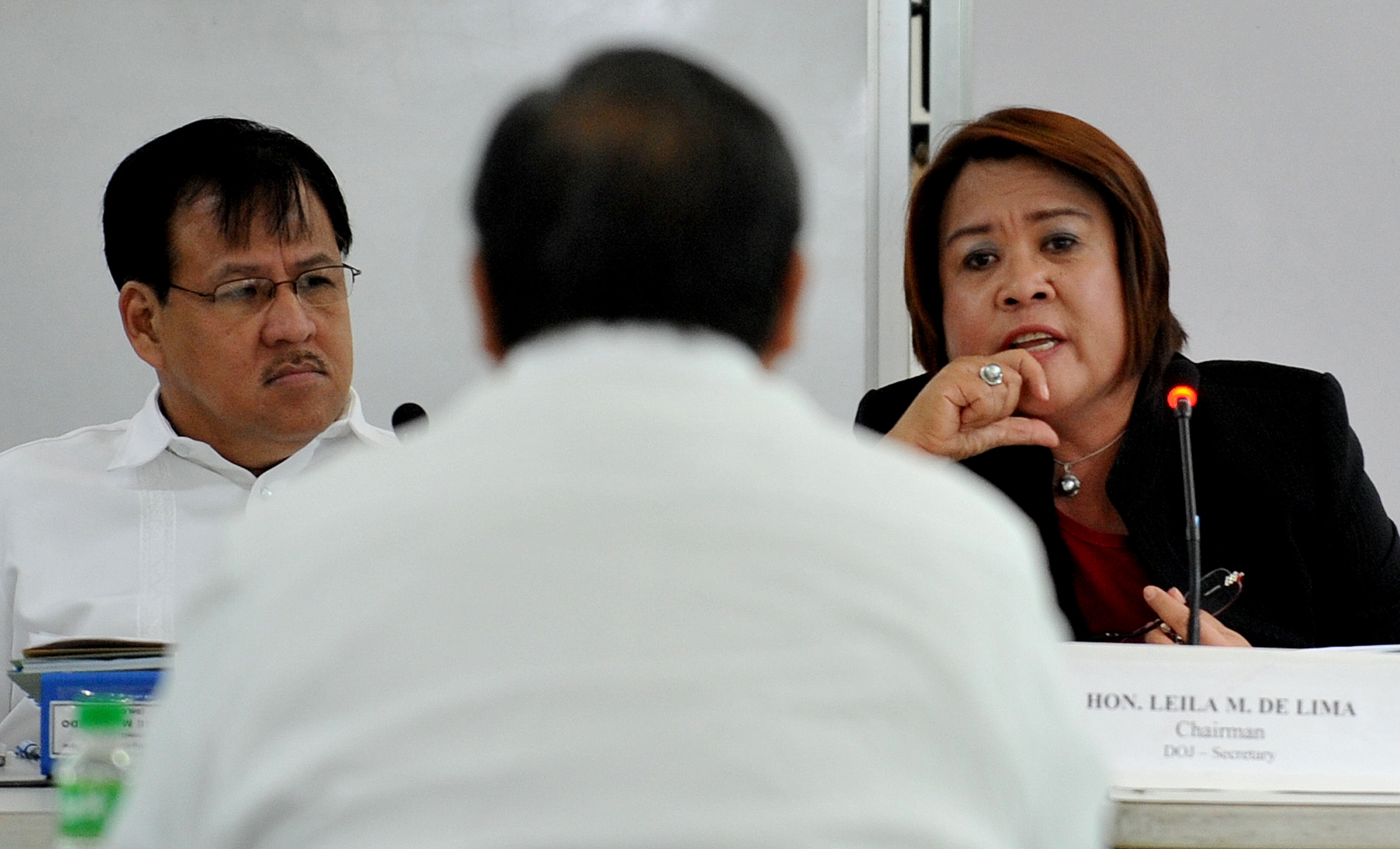 Leila de Lima, right, as a freshly appointed Justice Secretary, chairs a hearing on Sept. 3, 2010, into the Manila hostage crisis that saw eight Hong Kong tourists killed (AFP/Getty Images)