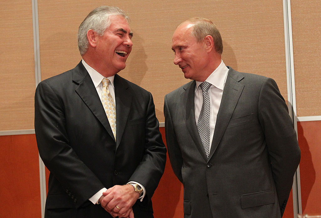Russian President Vladimir Putin (R) and Rex Tillerson (L) during a signing ceremony for an arctic oil exploration deal between Exxon Mobil and Rosneft on August, 30, 2011 in Sochi, Russia. (Sasha Mordovets—Getty Images)