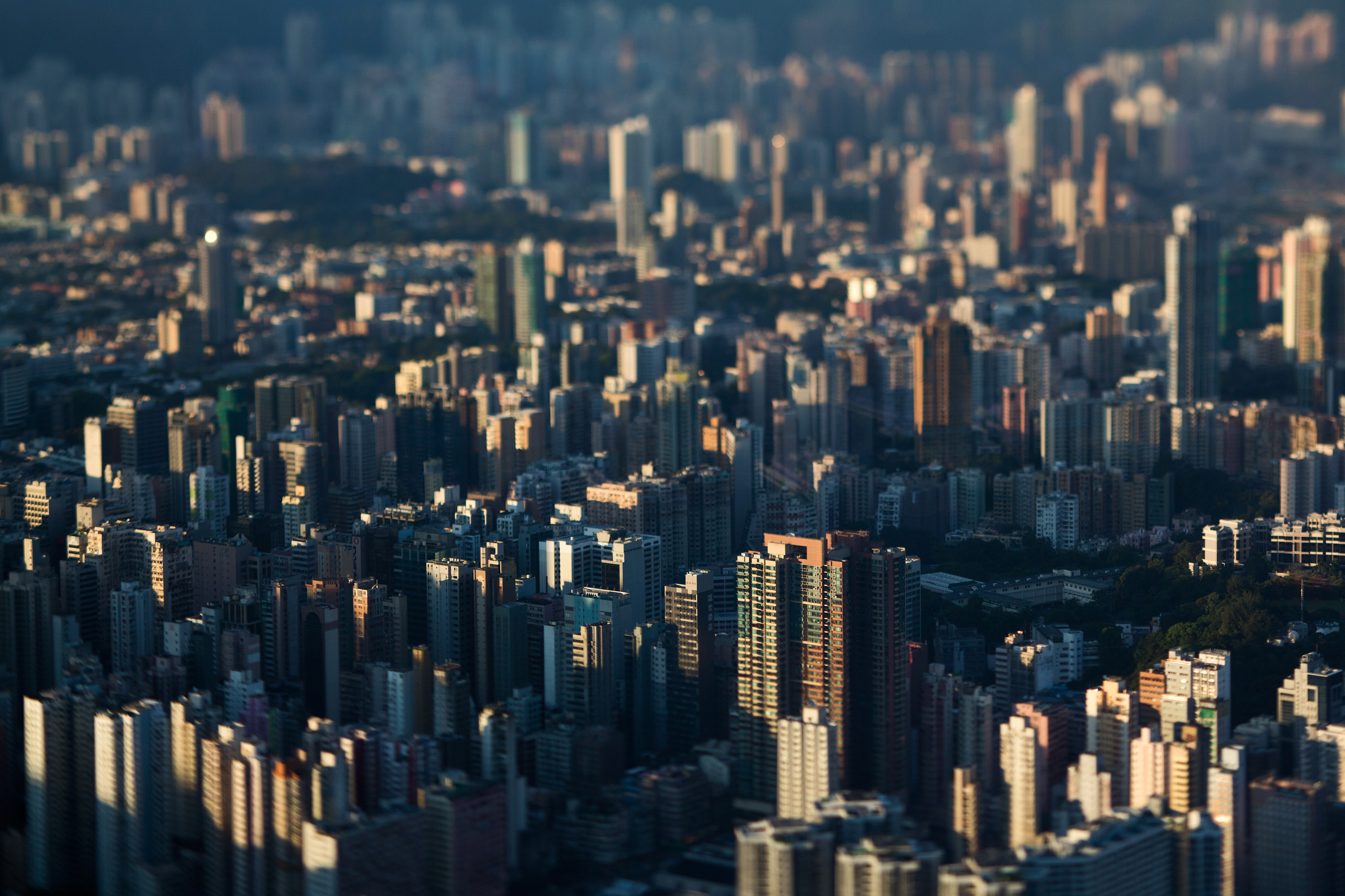 Commercial and residential buildings stand in the West Kowloon district in this photograph taken with a tilt-shift lens in Hong Kong on July 21, 2016 (Seong-Joon Cho—Bloomberg/Getty Images)