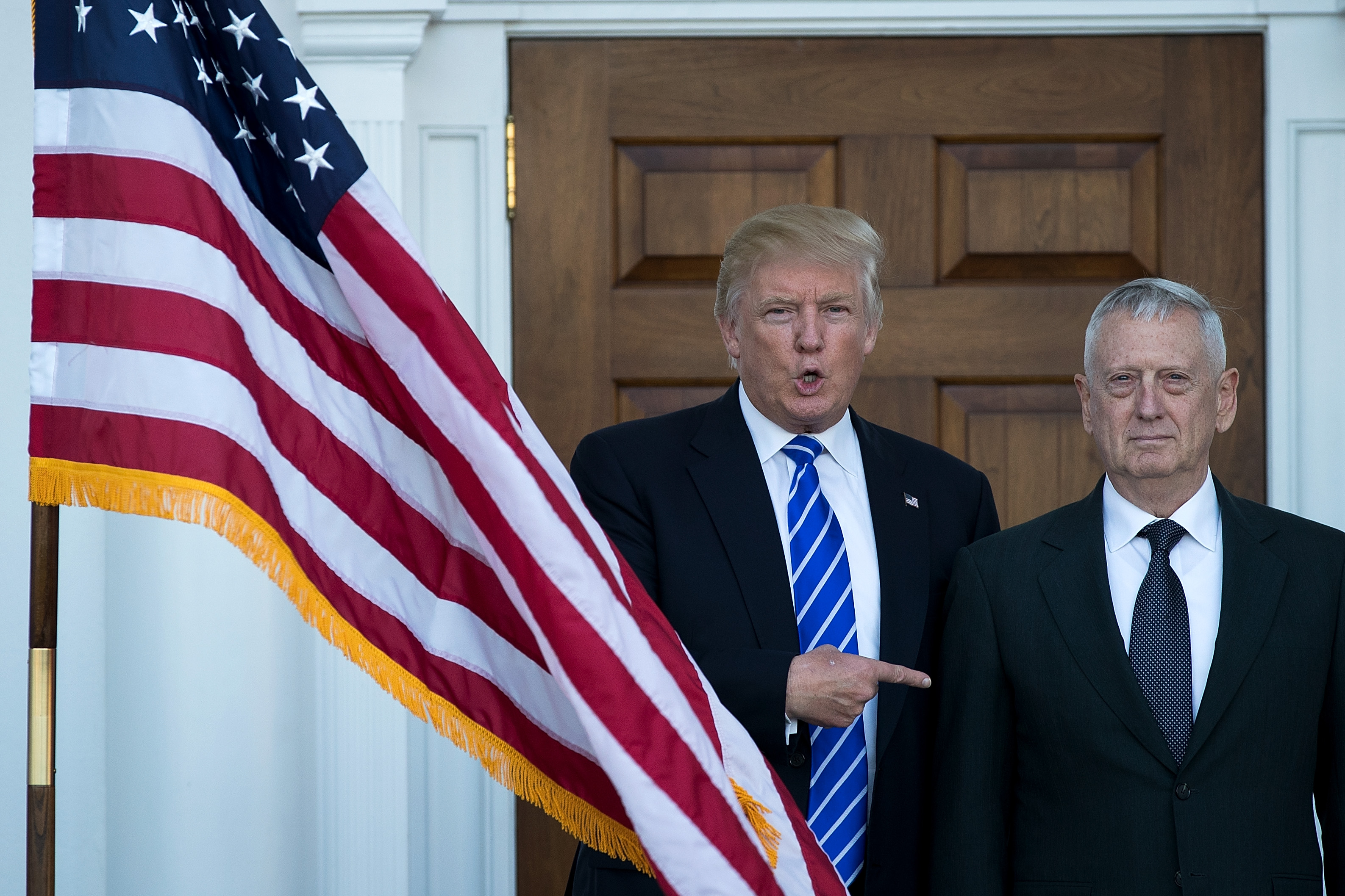 President-elect Donald Trump welcomes retired United States Marine Corps general James Mattis to Trump International Golf Club in Bedminster, N.J.,  November 19, 2016. (Drew Angere—Getty Images)