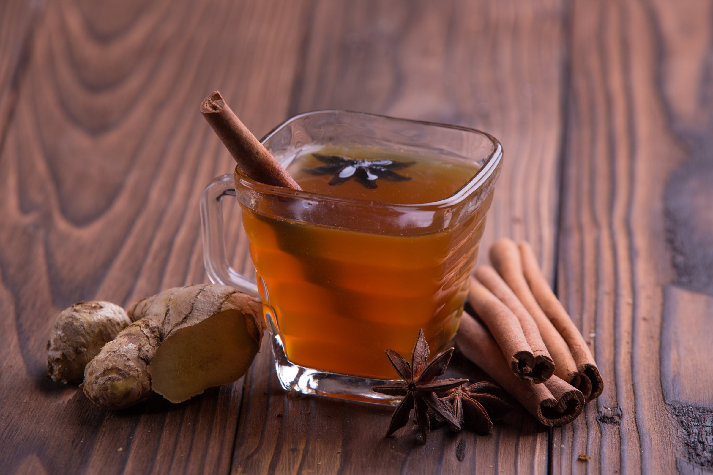Warm drink for winter: tea, cinnamon, star anise, and ginger