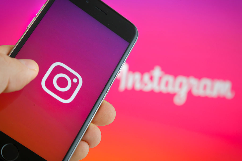 In this photo illustration, the logo of Instagram is displayed on a smartphone on Sept. 27, 2016 in Berlin, Germany. (Thomas Trutschel&mdash;Photothek via Getty Images)