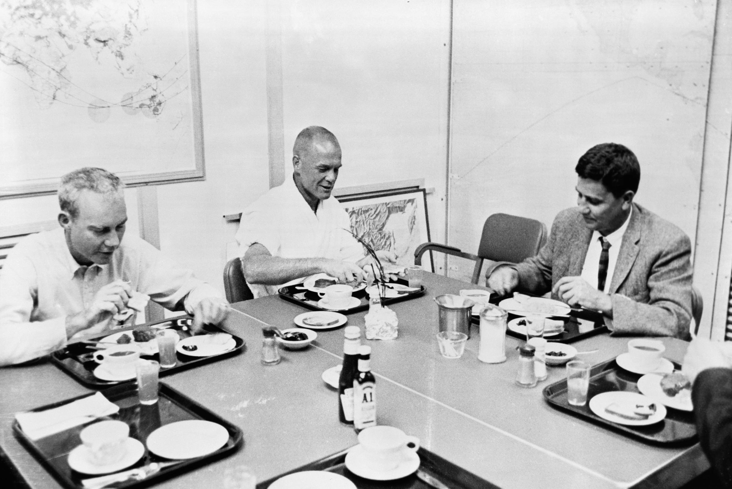 Food for Flight Glenn, center, has his prelaunch breakfast on Feb. 20, 1962, with two NASA officials. The traditional meal — steak, eggs, toast, coffee and juice — was a surprisingly heavy one for a man about to experience the stomach-flipping phenomenon of zero g.