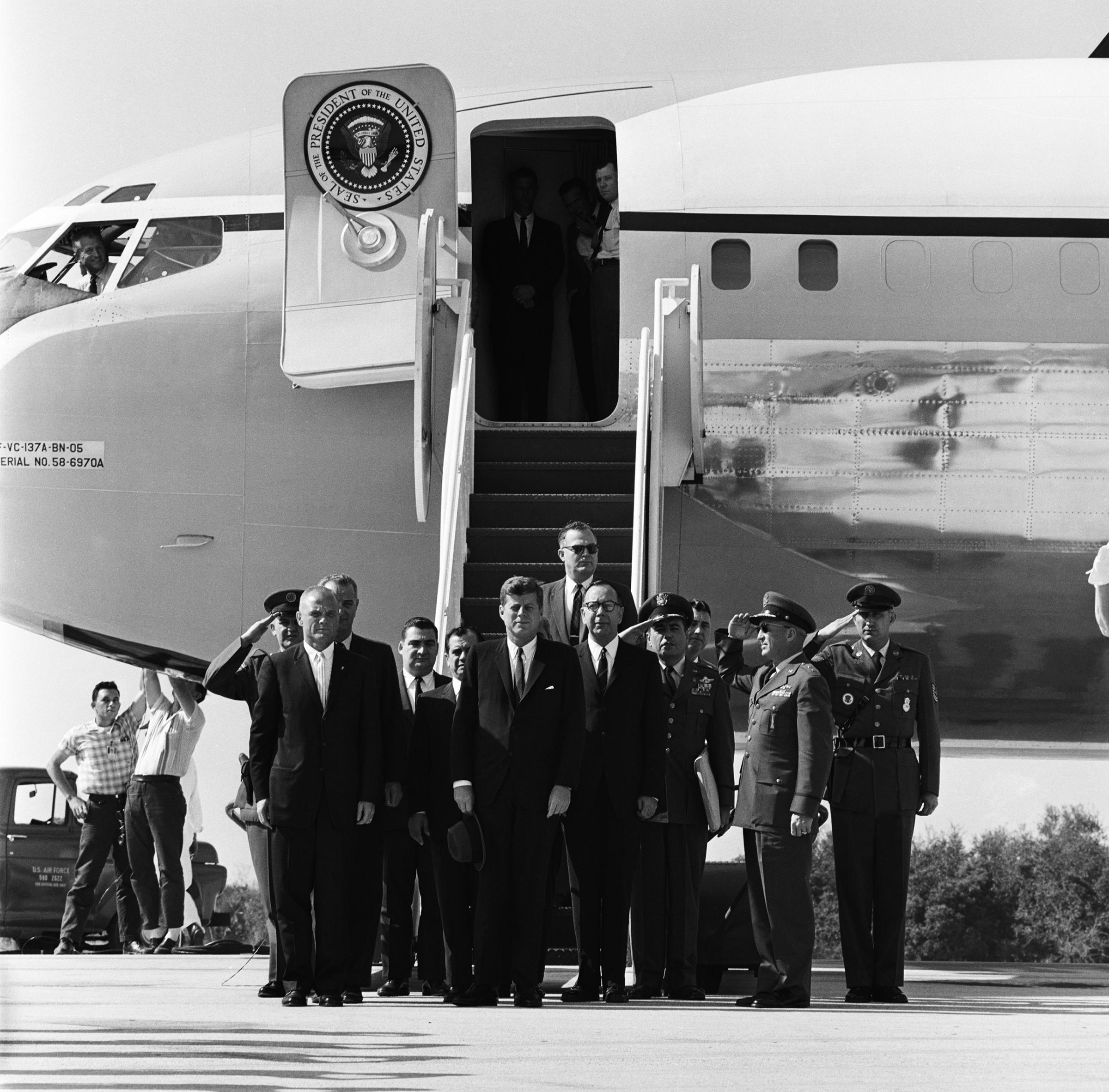 A Presidential Tribute On Feb. 23, 1962, three days after the successful mission, President Kennedy and Vice President Johnson visit Cape Canaveral, Fla., to present Glenn with NASA's Distinguished Service Medal. (Johnson is visible just behind Glenn at left.)