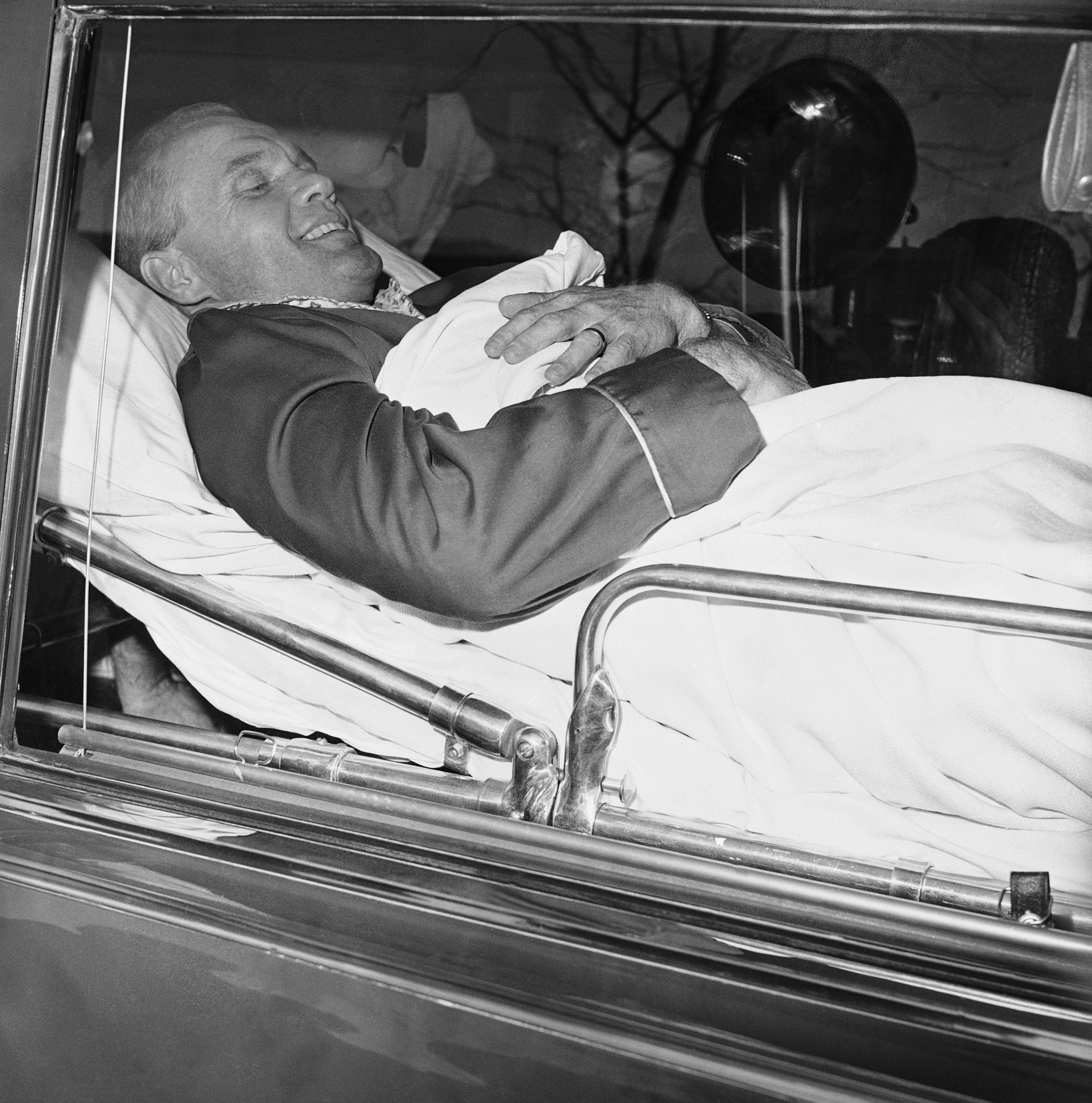 A Medical Mission In an ambulance in Ohio, Glenn prepares to be flown to Lackland Air Force Base in Texas for further treatment of his inner-ear injury in 1964.