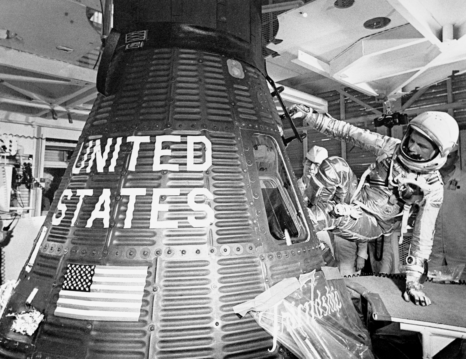 John Glenn boards the Friendship 7 capsule to become the first American to orbit the earth, during the Mercury-Atlas 6) mission, on Feb. 20, 1962.