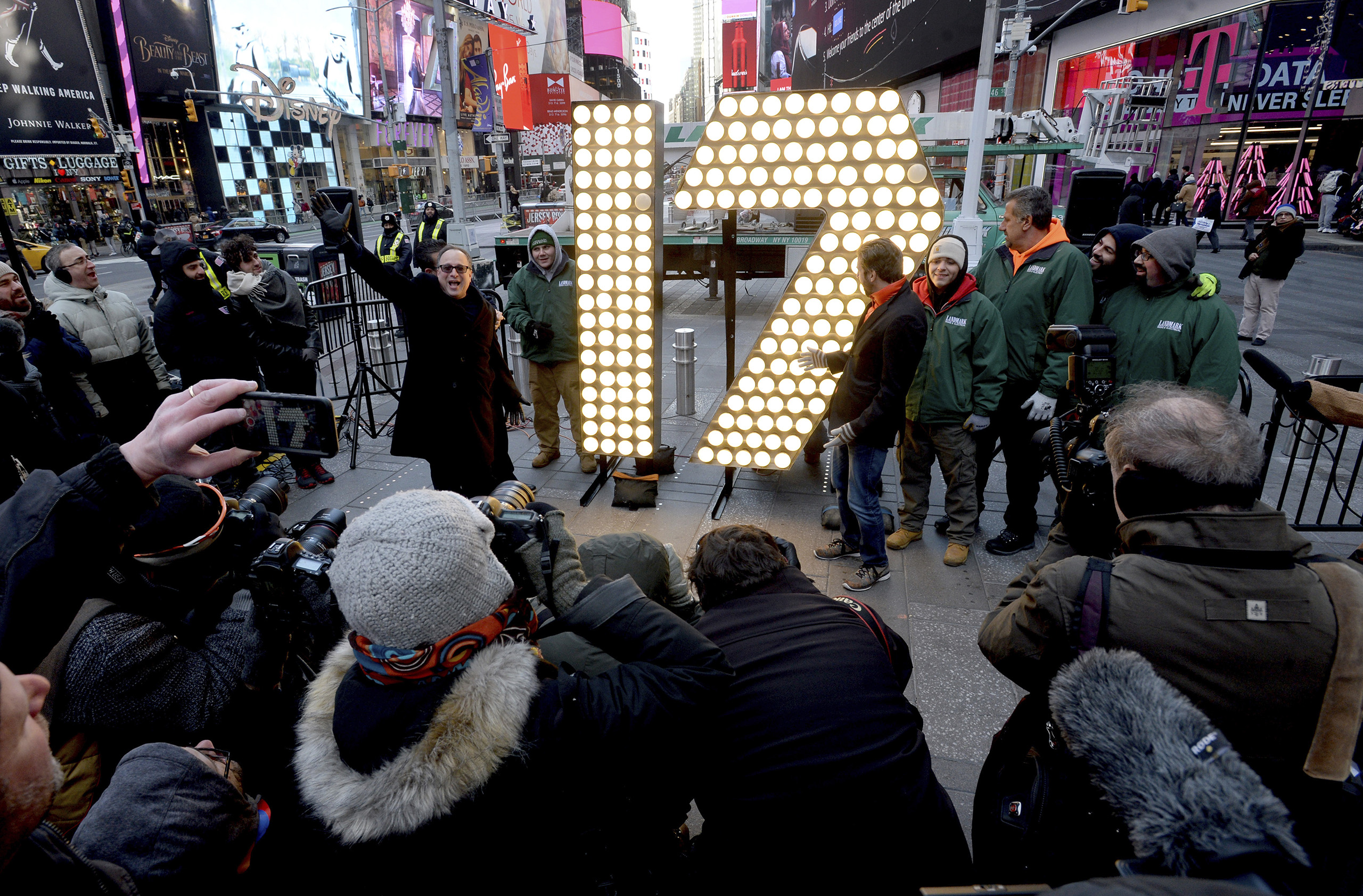 The numerals '1' and '7,' to be used to spell out '2-0-1-7' for the Times Square New Years Eve celebration, are unloaded from a flatbed truck before being unveiled in Times Square in New York City, on Dec. 15, 2016. (Dennis Van Tine—Sipa USA/AP)