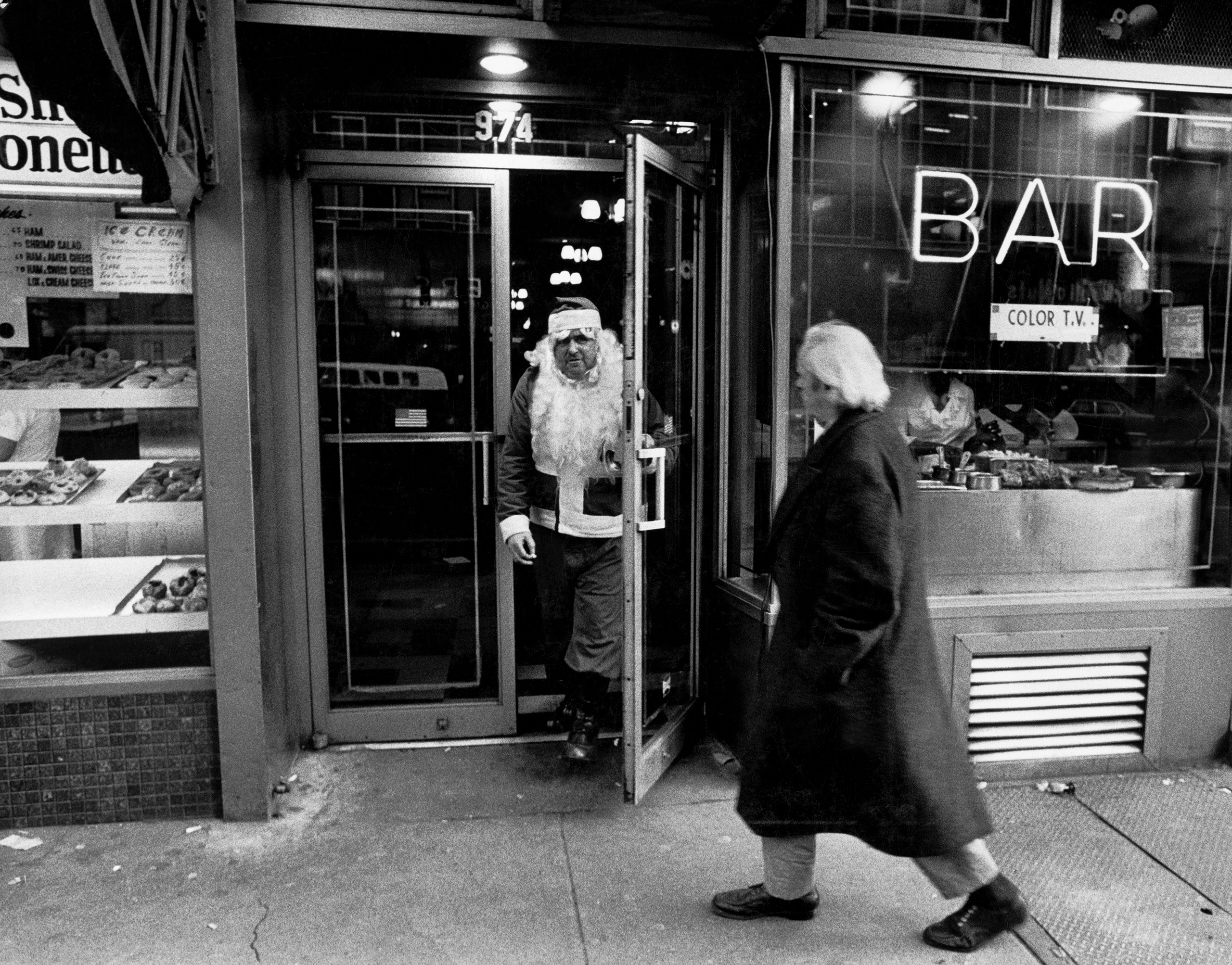 New York City. 1968. Santa leaving bar.