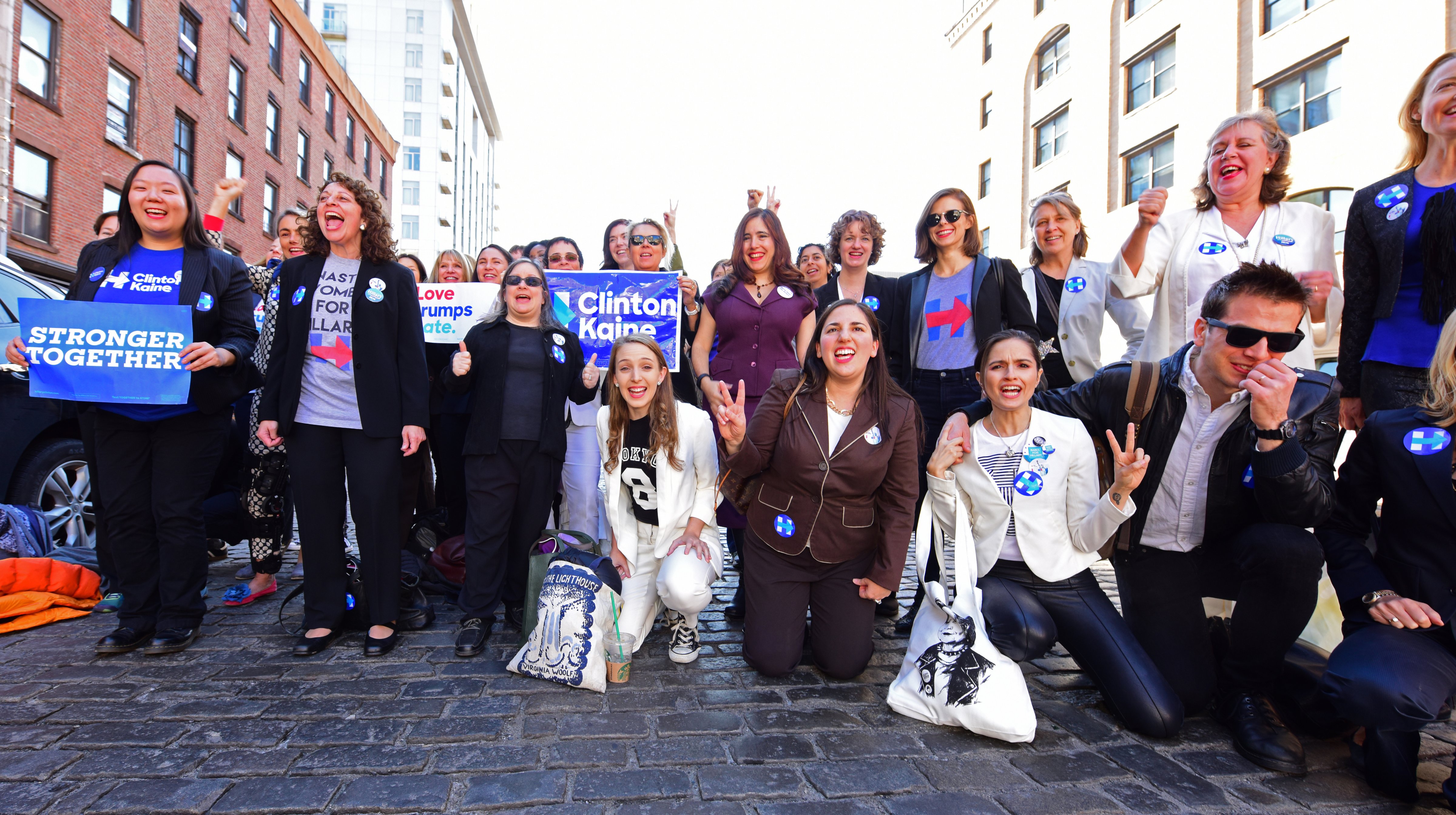 Election Day in New York City was marked with a rally for Hillary Clinton at Jacob Javits Center, Clinton supporters known as Pantsuit Nation gathered for a photo shoot in Chelsea, flowers in the shaped  
