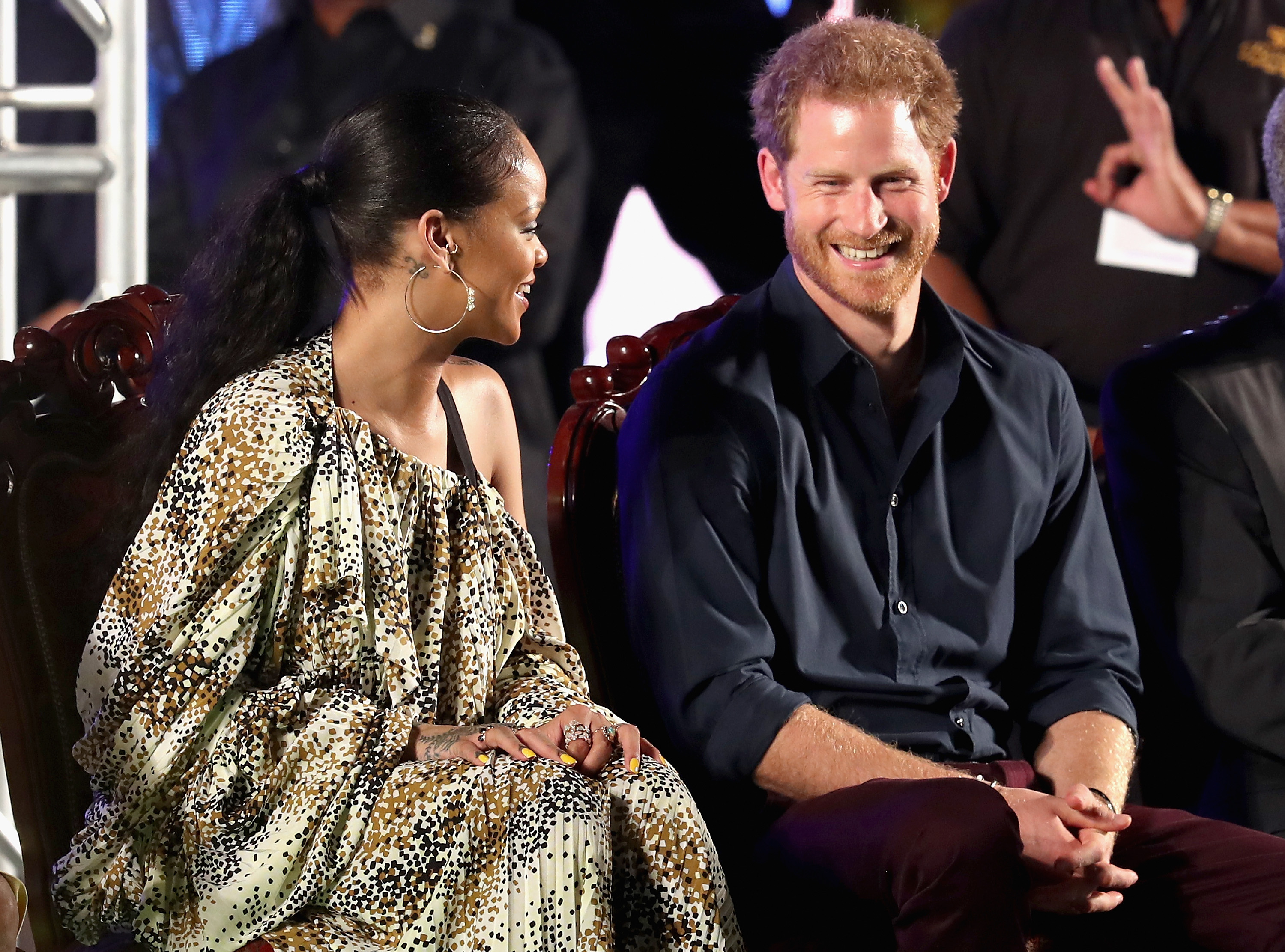 Prince Harry and singer Rihanna attend a concert at the Kensington Oval Cricket Ground on day 10 of an official visit to the Caribbean on November 30, 2016 in  Bridgetown, Barbados. (Chris Jackson—Getty Images)