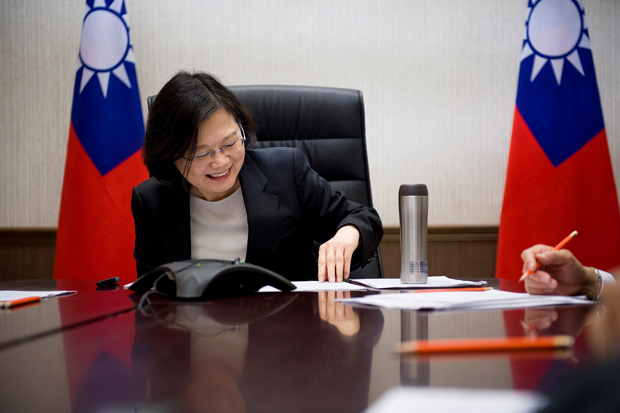Taiwan's President Tsai Ing-wen speaks on the phone with U.S. president-elect Donald Trump at her office in Taipei