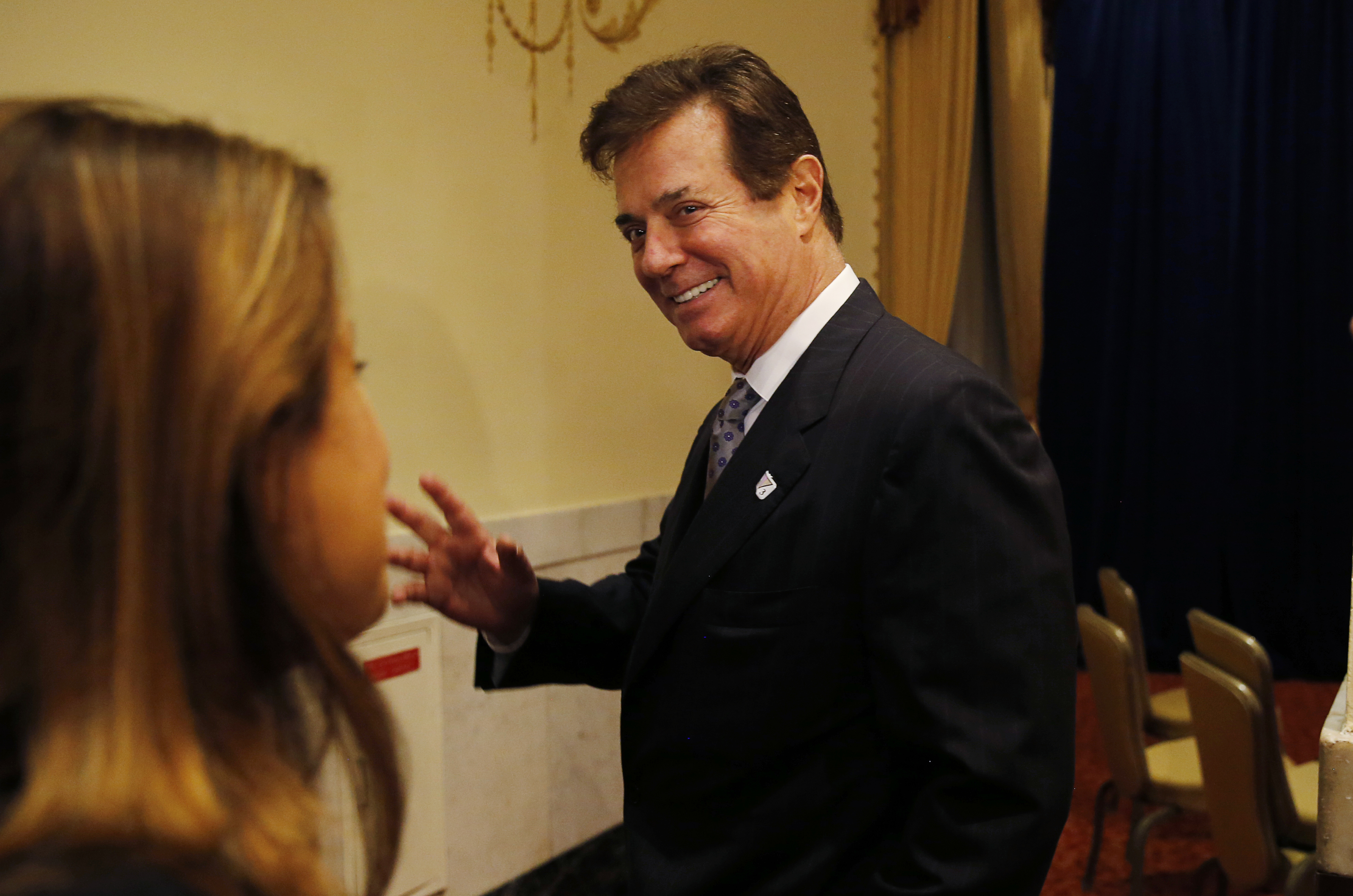 Paul Manafort, senior aide to Republican U.S. presidential candidate Donald Trump, waves goodbye to reporters after Trump delivered a foreign policy speech at the Mayflower Hotel in Washington, D.C., on April 27, 2016 (Jim Bourg—Reuters)