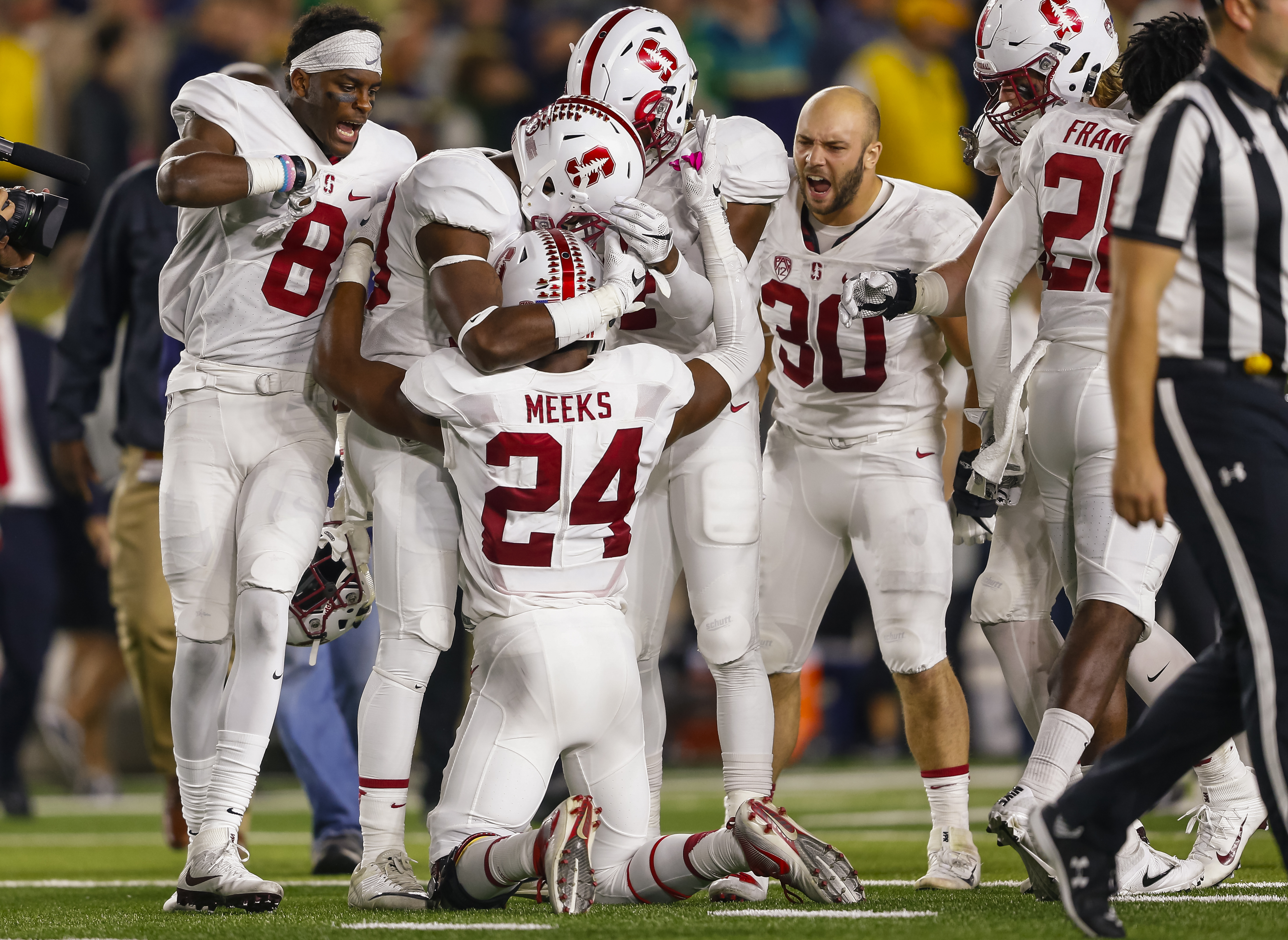 Members of the Stanford Cardinal celebrate after the game against the Notre Dame Fighting Irish at Notre Dame Stadium on Oct. 15, 2016 in South Bend, Indiana. (Michael Hickey—Getty Images)