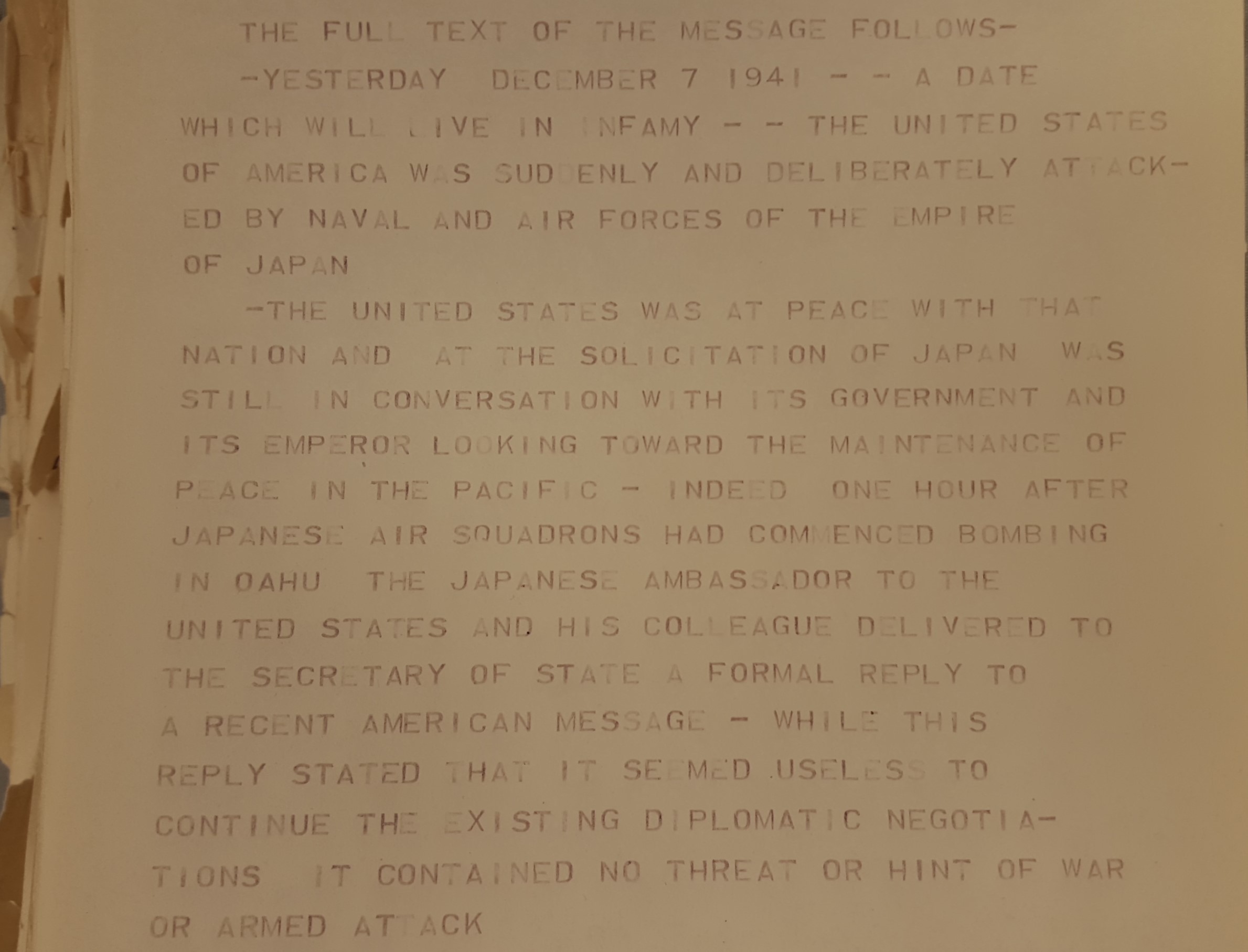 Close-up of a teletype copy of FDR's Pearl Harbor speech (Courtesy Museum of World War II)