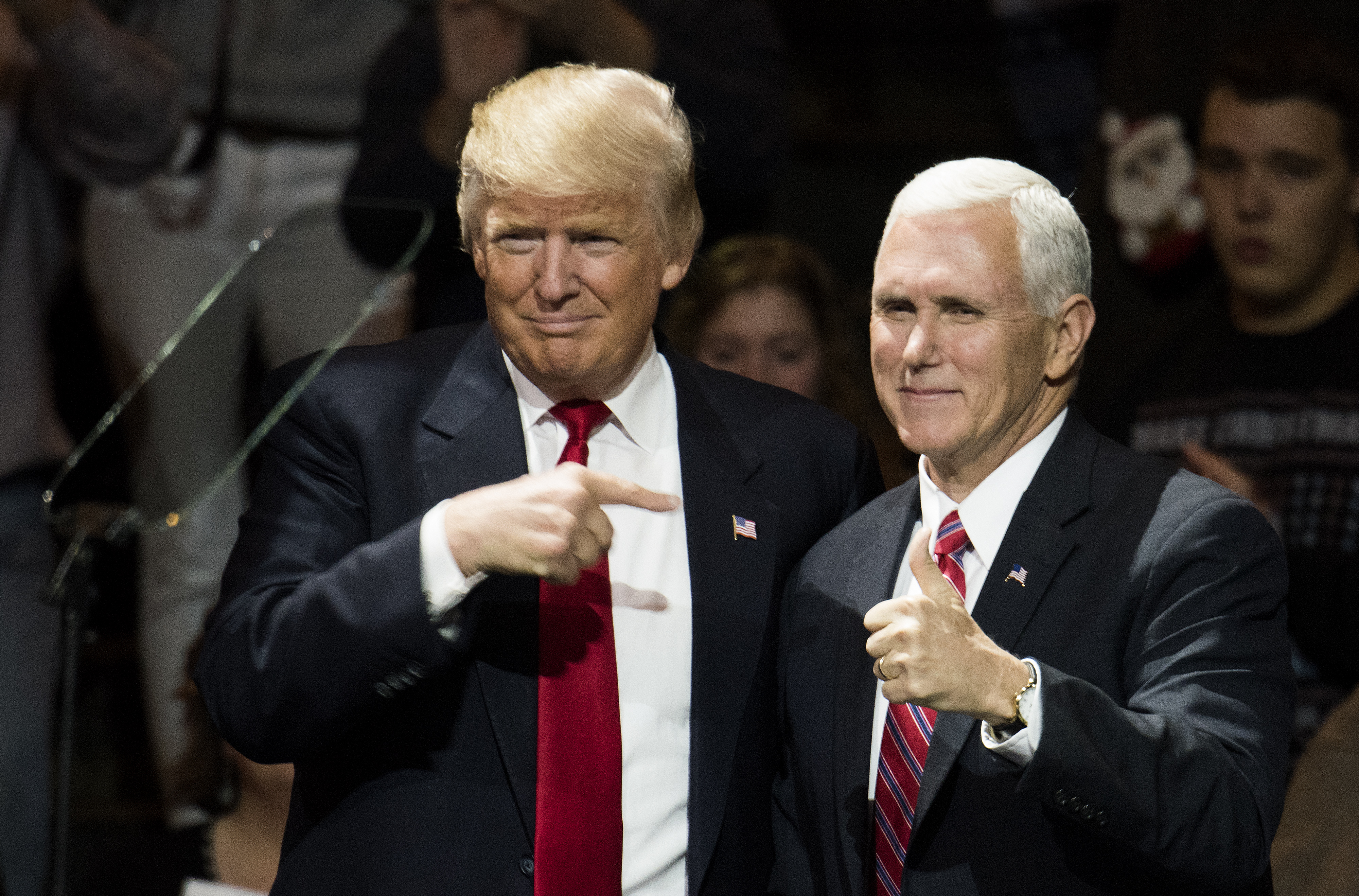 President-elect Donald Trump and Vice President-elect Mike Pence stand onstage together at U.S. Bank Arena in Cincinnati on Dec. 1, 2016. (Ty Wright—Getty Images)