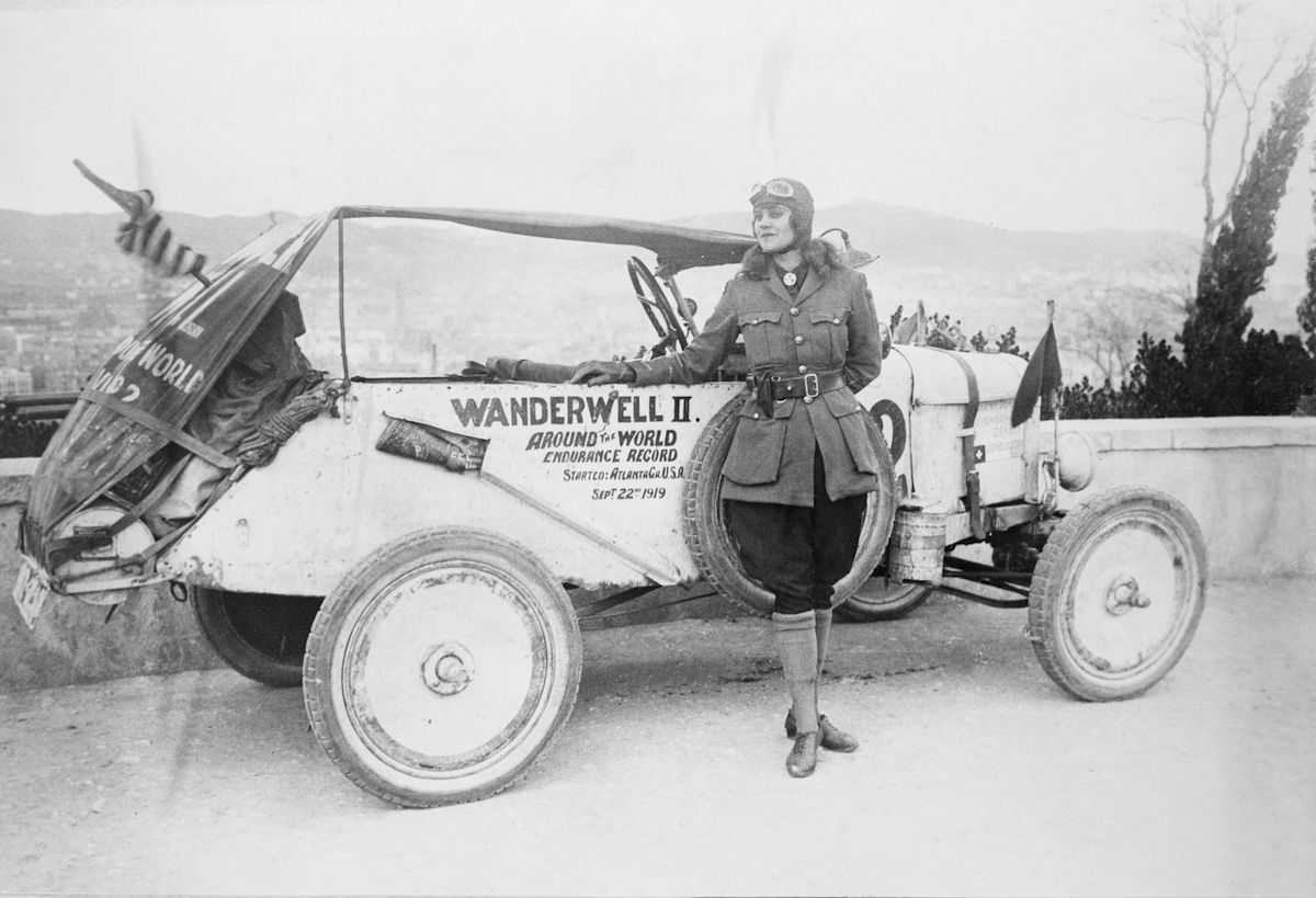 Miss Wanderwell reaches Barcelona during her attempt to set an endurance record by driving a motor car around the world. She set off from Atlanta in September 1919. (Vidal / Getty Images)