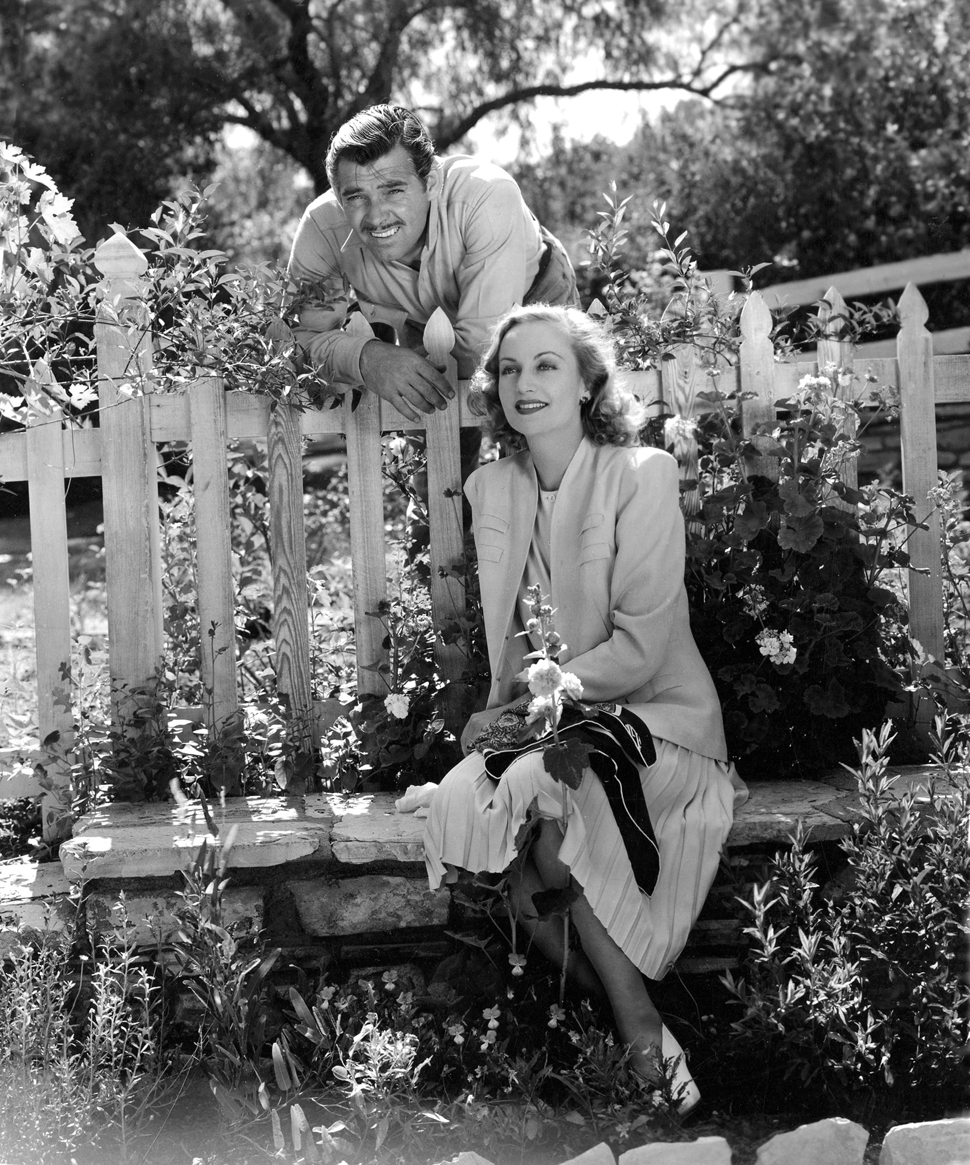 Newlyweds Clark Gable and Carole Lombard Gable pose for a series of official photos at their ranch in Encino California in April 1939.
