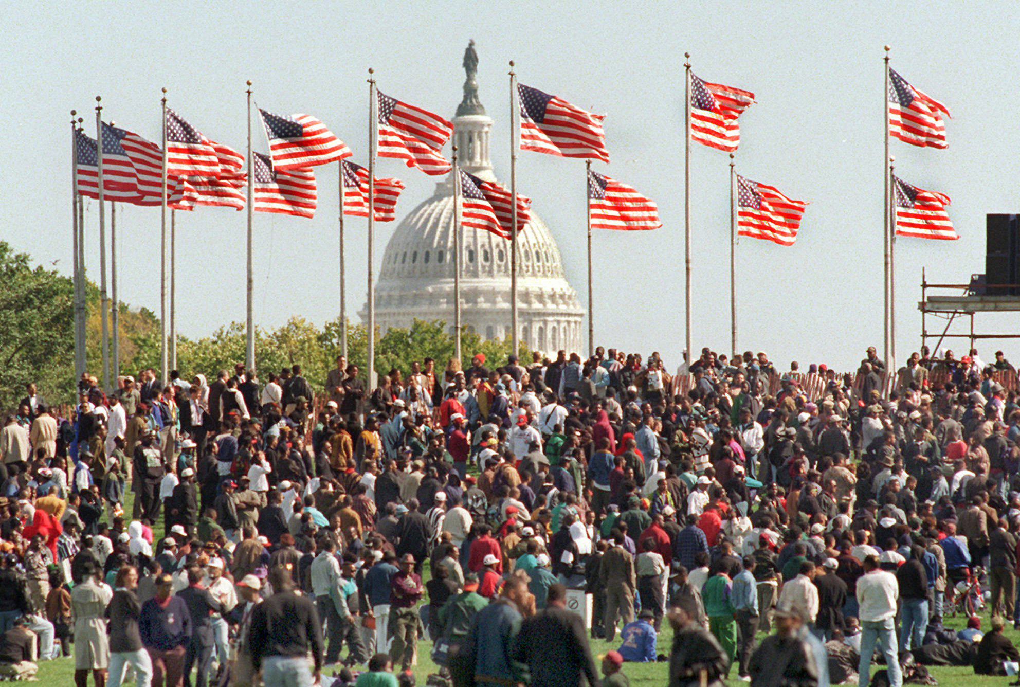 participants in the Million Man March gather on the Washington Monument grounds Monday Oct. 16, 1995. Tens of thousands of black men from across America gathered at the base of the Capitol, and the Mall, in a rally of unity, self-affirmation and protest.