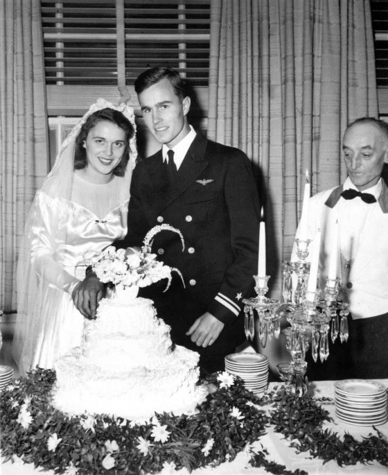 George and Barbara Bush cut their wedding cake, Rye, New York on Jan. 6, 1945.