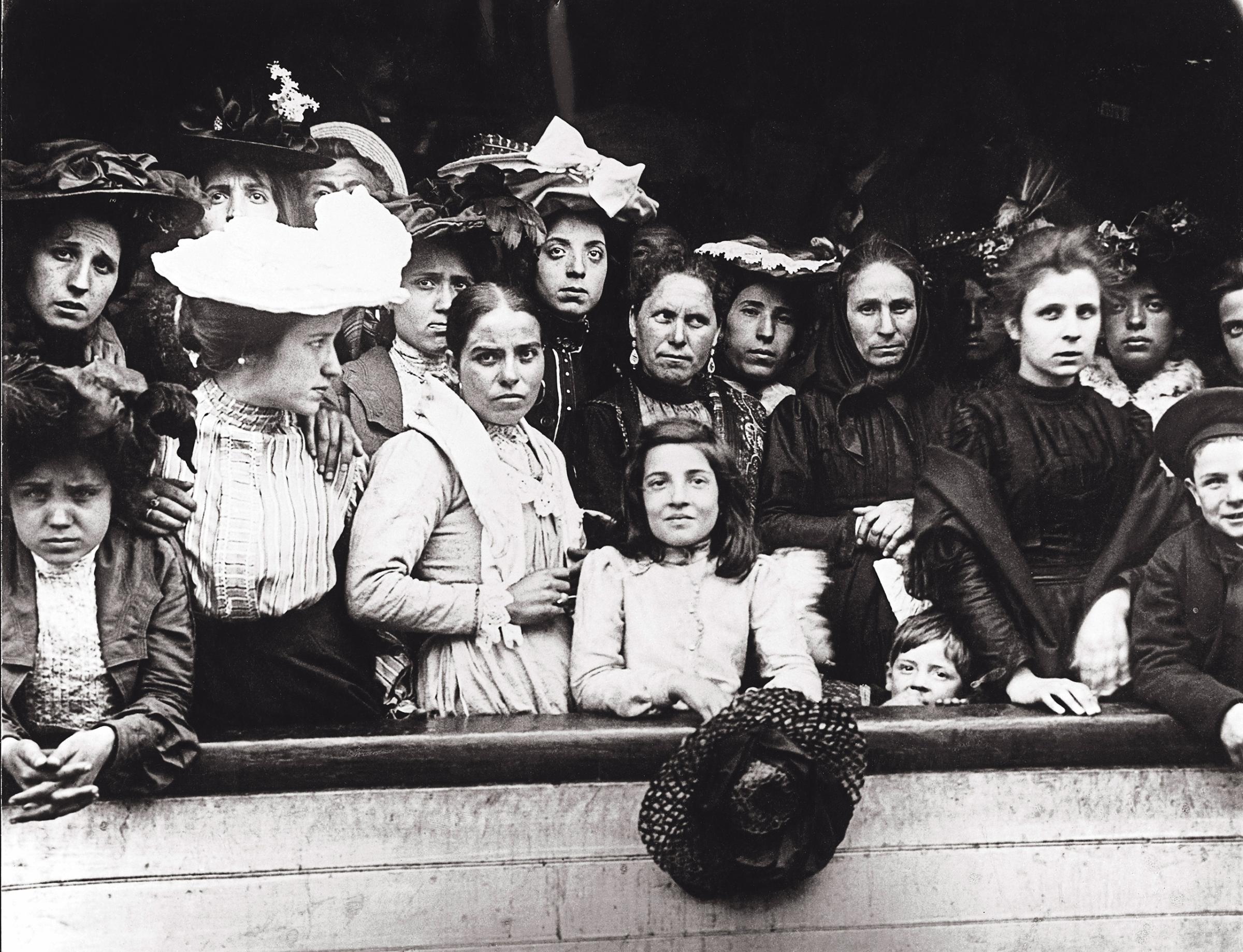 Immigrants on board of a ship arriving in New York, circa 1910.