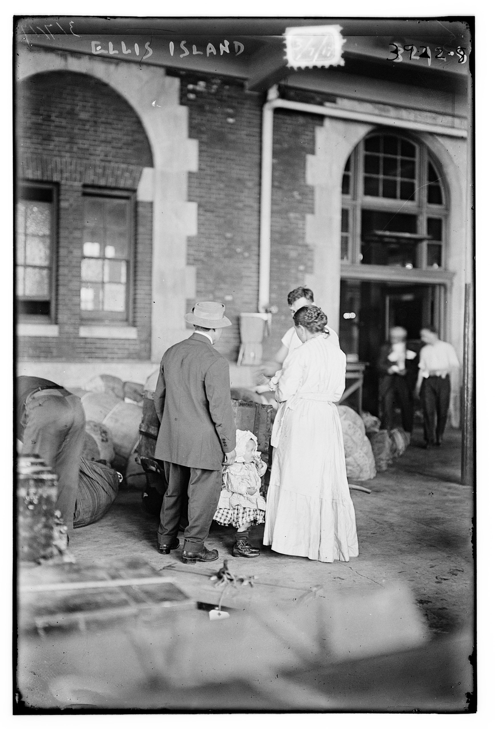Immigrant family at Ellis Island. New York City. March 1917.