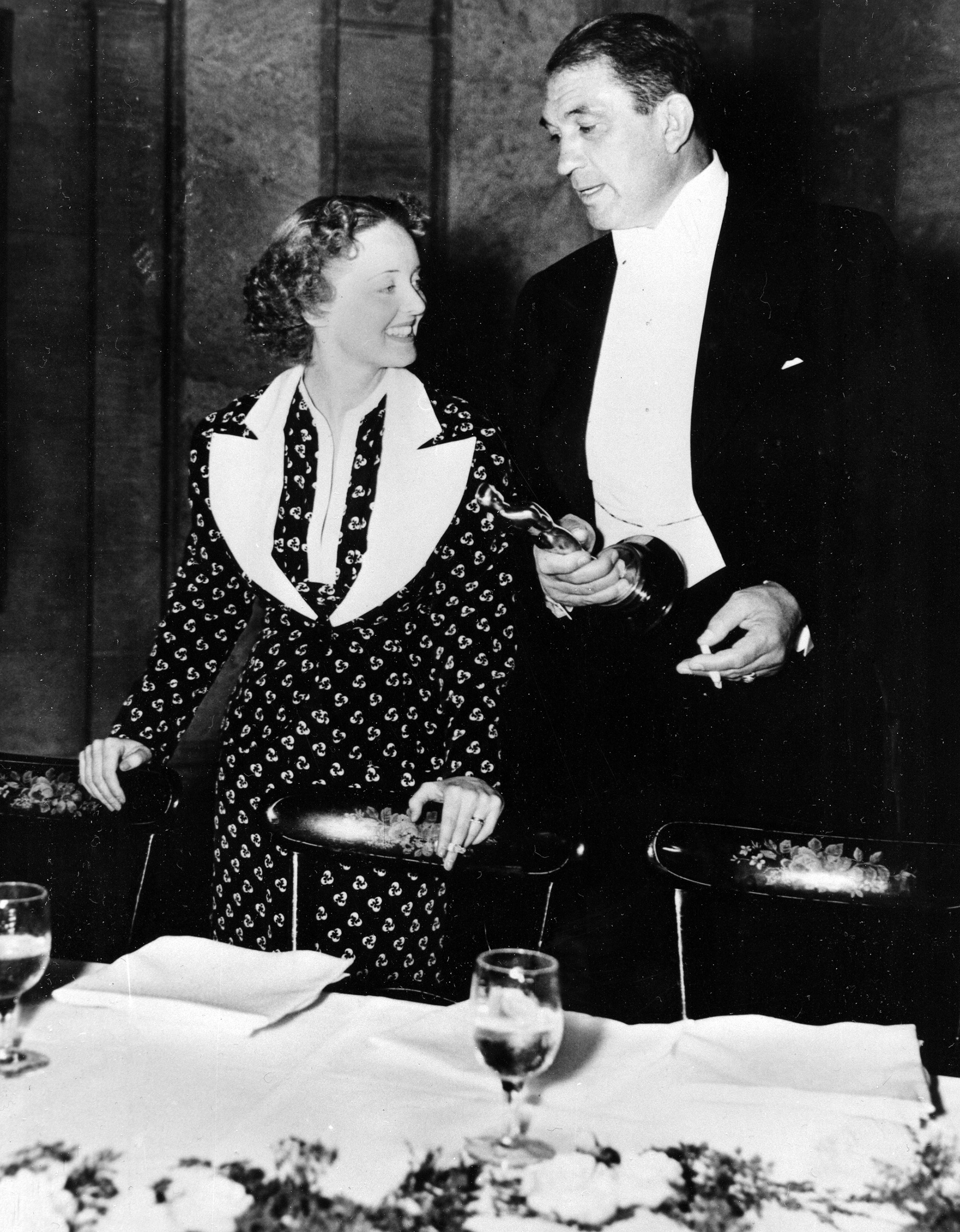 Bette Davis and Victor McLaglen after winning their Oscars at the Academy Awards banquet, 1935.