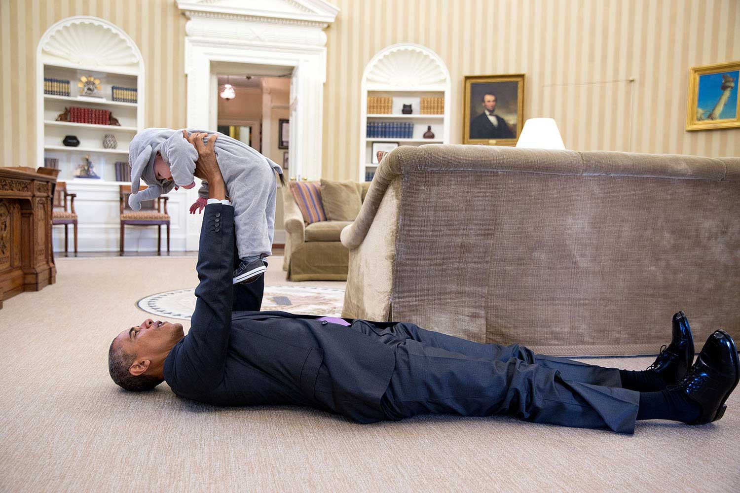 Benjamin Rhodes, Assistant to the President and Deputy National Security Advisor for Strategic Communications and Speechwriting 2009-Present:  
                              Selected this Souza photograph of the President playing with his daughter who is in a elephant costume.