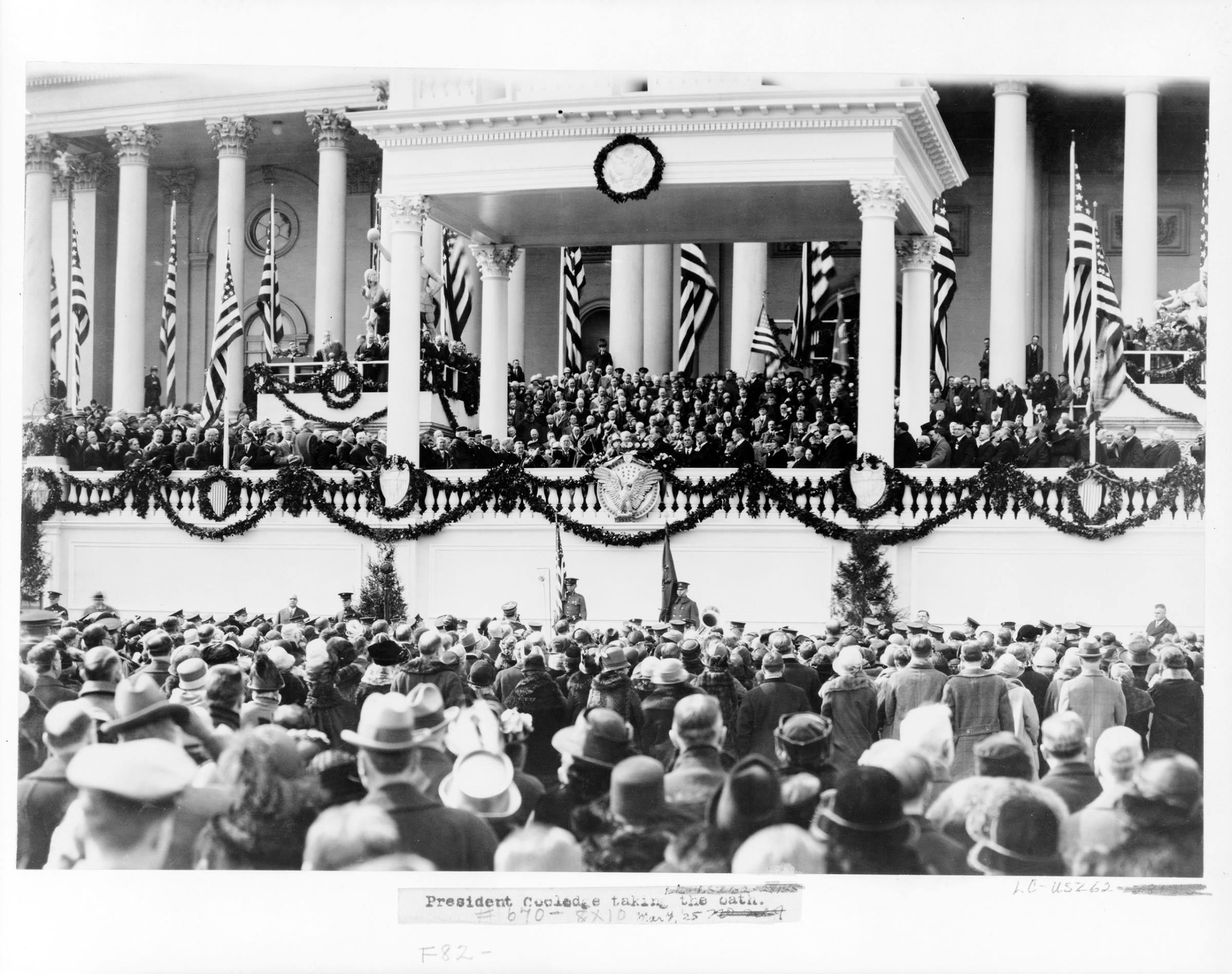 Chief Justice William H. Taft administering the oath of office to Calvin Coolidge on the east portico of the U.S. Capitol, March 4, 1925.