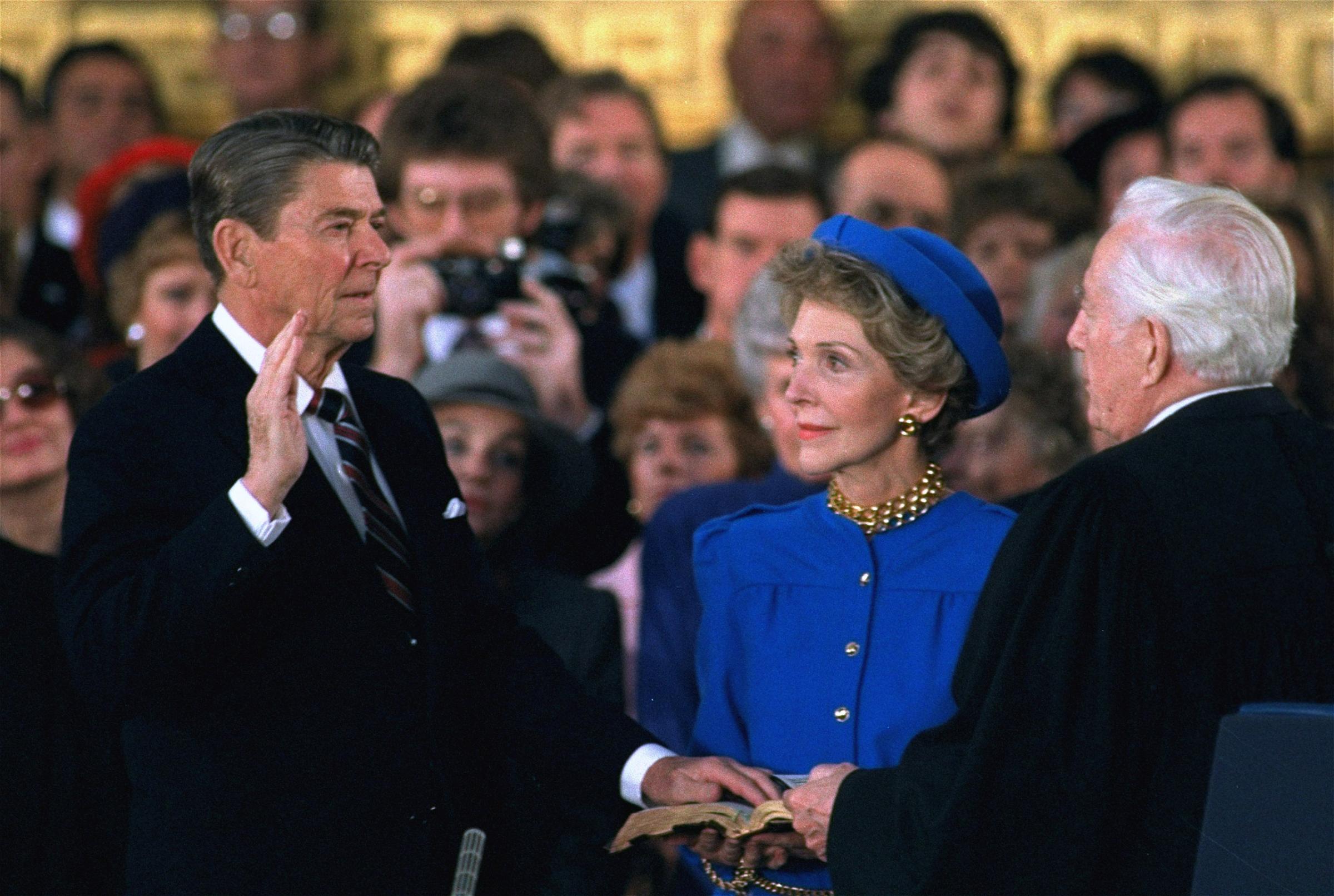 First Lady Nancy Reagan watches as President Ronald Reagan is sworn in during ceremonies in the Rotunda beneath the Capitol Dome in Washington, Jan. 21, 1985.
