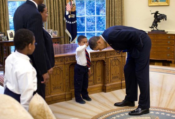 May 8, 2009“A temporary White House staffer, Carlton Philadelphia, brought his family to the Oval Office for a farewell photo with President Obama. Carlton’s son softly told the President he had just gotten a haircut like President Obama, and asked if he could feel the President’s head to see if it felt the same as his.”(Official White House photo by Pete Souza)This official White House photograph is being made available only for publication by news organizations and/or for personal use printing by the subject(s) of the photograph. The photograph may not be manipulated in any way and may not be used in commercial or political materials, advertisements, emails, products, promotions that in any way suggests approval or endorsement of the President, the First Family, or the White House.