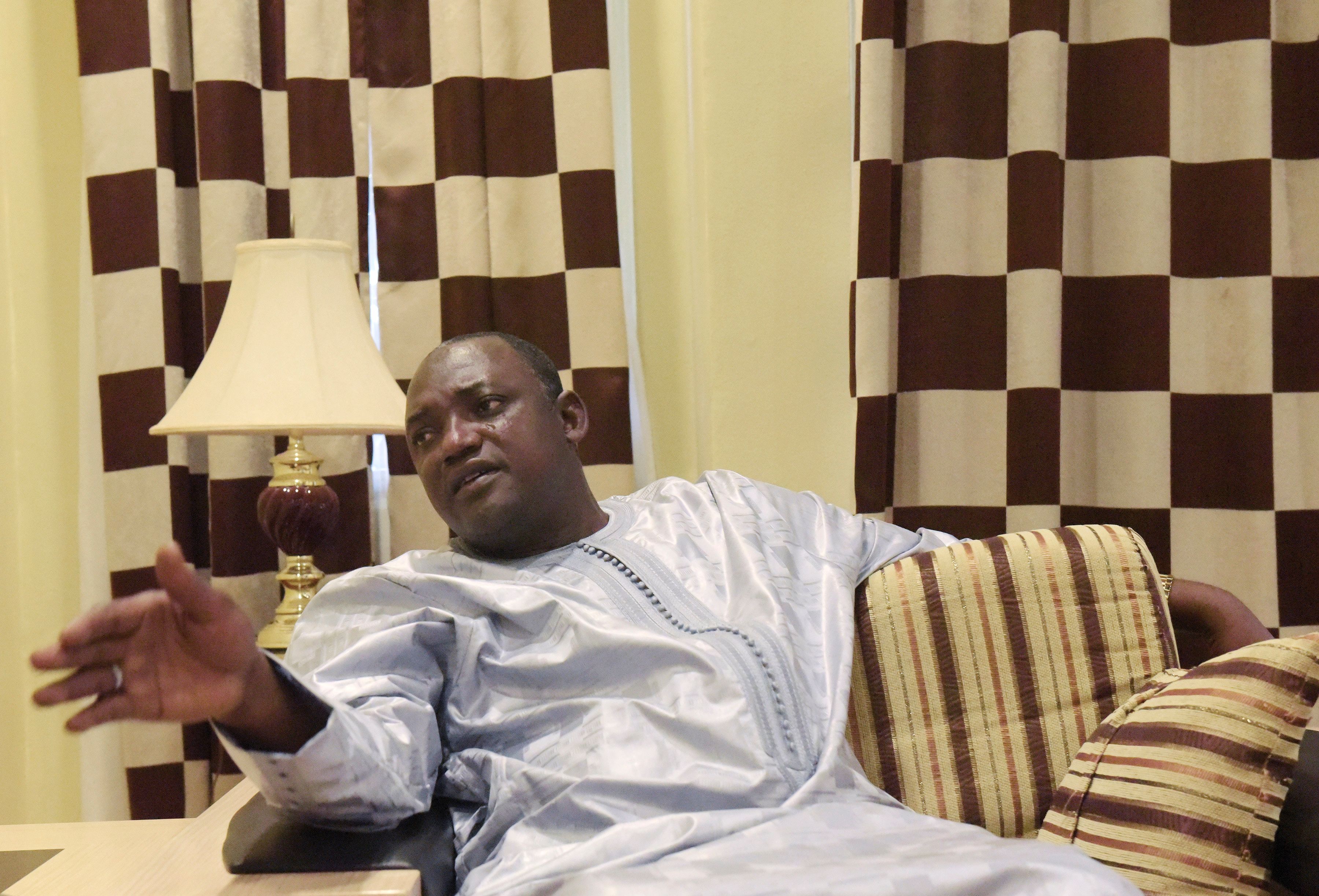 Gambian president-elect Adama Barrow speaks during an interview in Banjul on December 12, 2016.