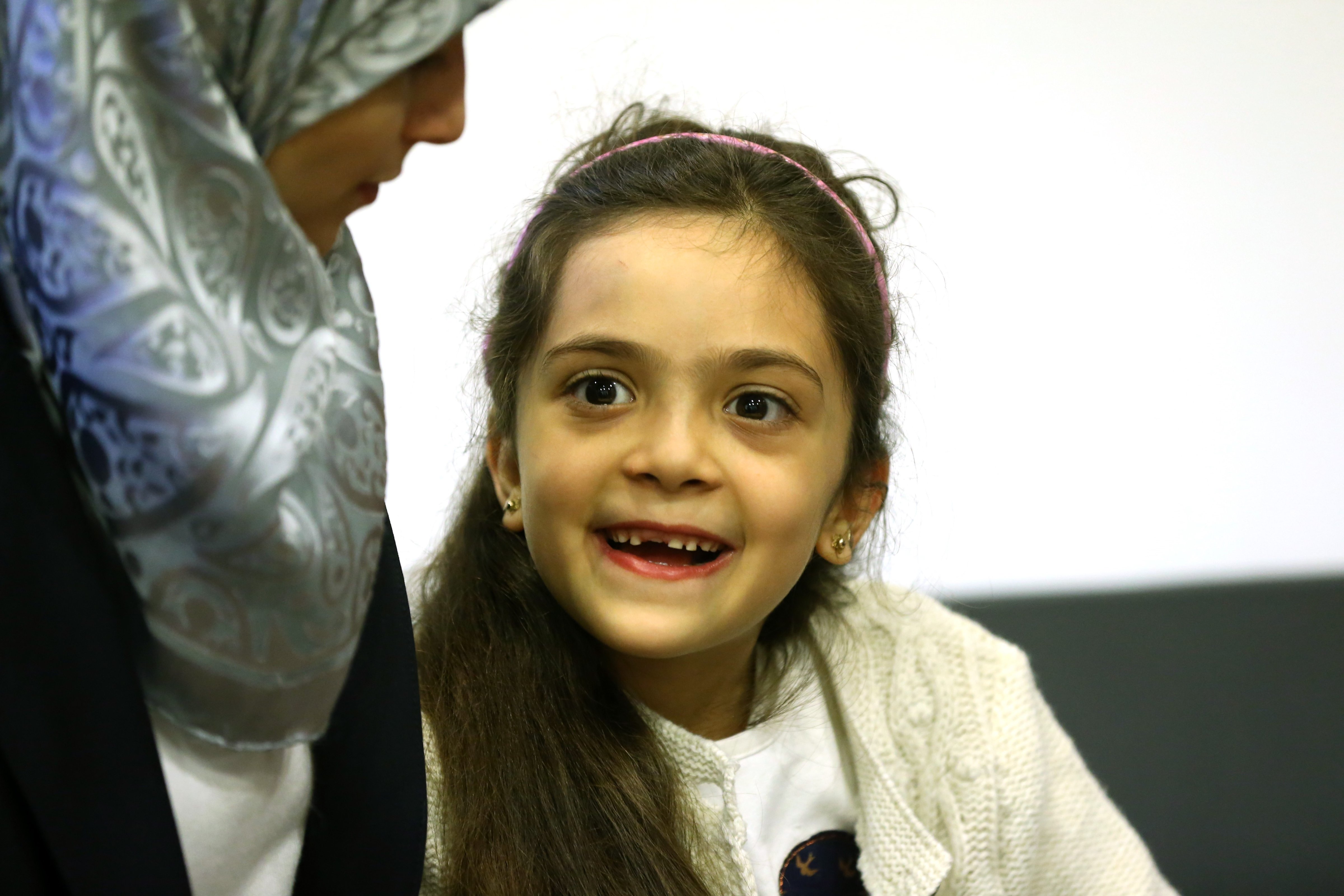 Syrian Bana Alabed (R), a seven-year-old girl who tweeted about the attacks in Aleppo, speaks to media with her family after she met with Turkish President Recep Tayyip Erdogan in Ankara, Turkey on December 21, 2016. (Anadolu Agency—Getty Images)
