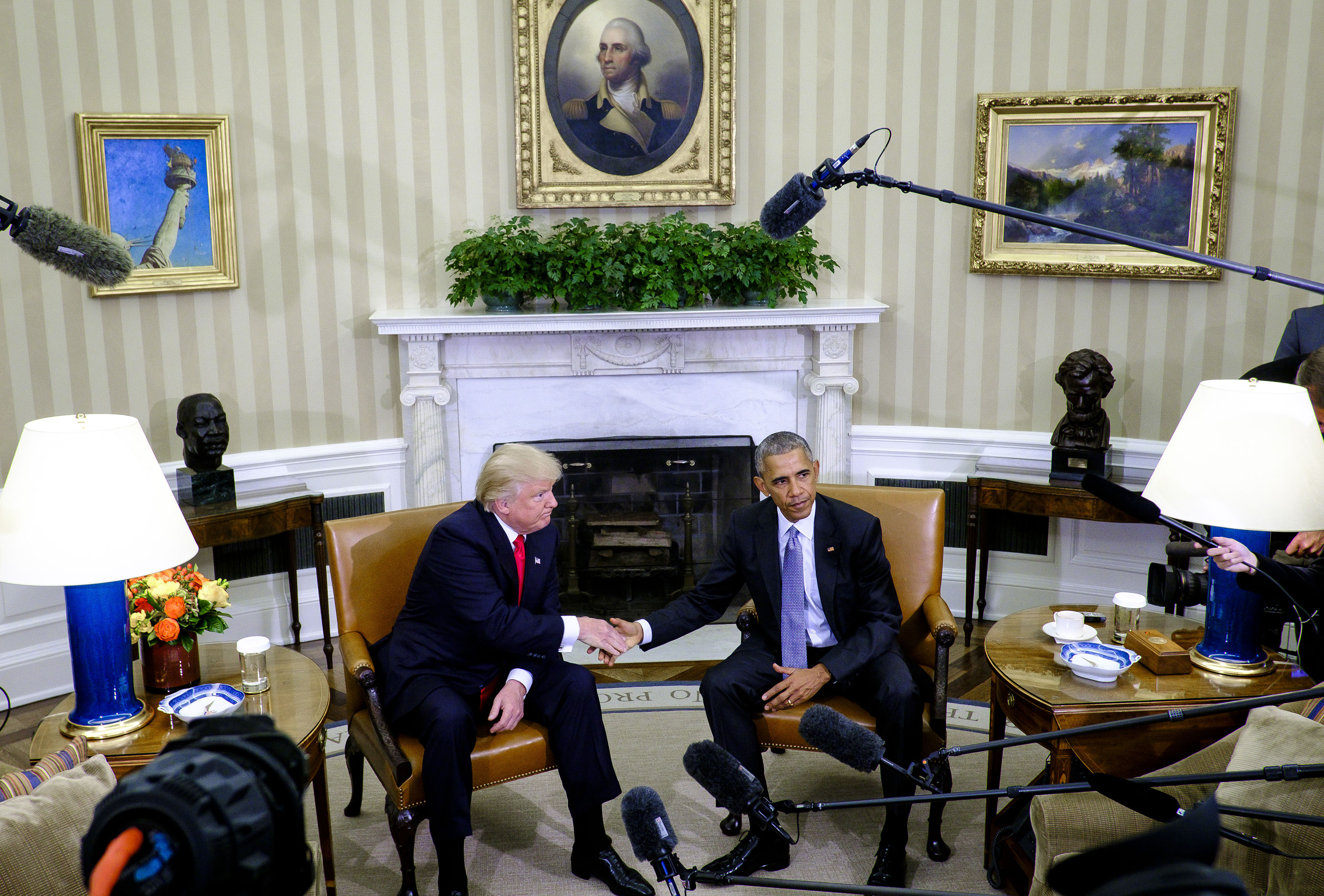 President Barack Obama, right, shakes hands with President-elect Donald Trump during a news conference in the Oval Office of the White House on Nov. 10, 2016. (Pete Marovich—Bloomberg/Getty Images)
