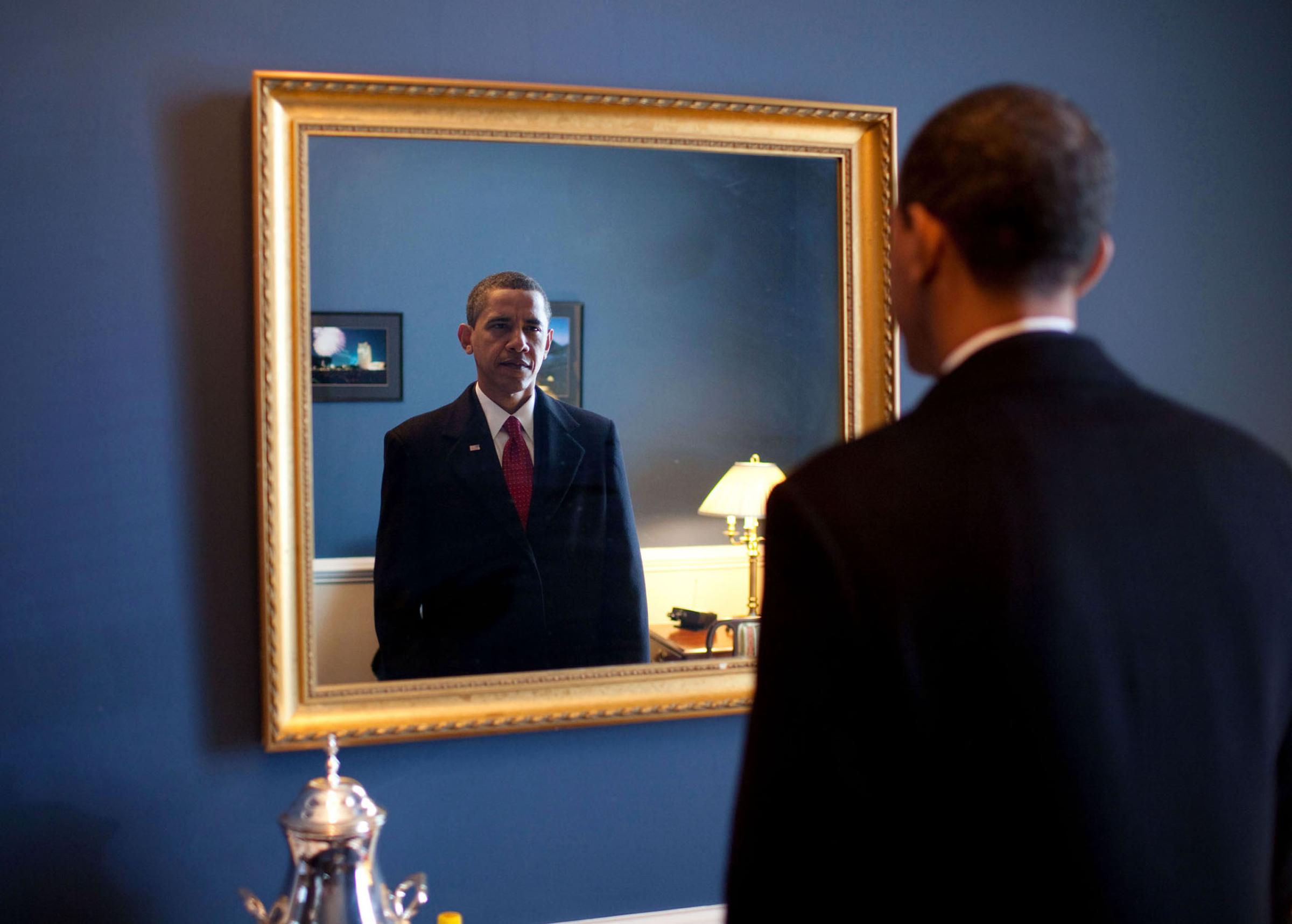 Jan. 20, 2009 “President-elect Barack Obama was about to walk out to take the oath of office. Backstage at the U.S. Capitol, he took one last look at his appearance in the mirror.”(Official White House photo by Pete Souza)This official White House photograph is being made available only for publication by news organizations and/or for personal use printing by the subject(s) of the photograph. The photograph may not be manipulated in any way and may not be used in commercial or political materials, advertisements, emails, products, promotions that in any way suggests approval or endorsement of the President, the First Family, or the White House.