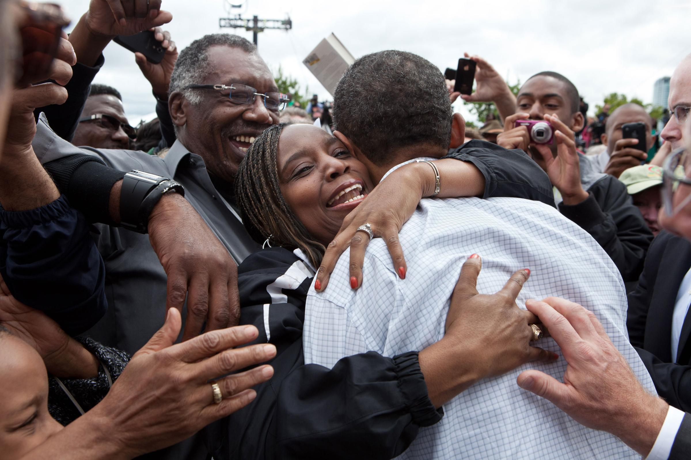 President Barack Obama hugs a woman in the crowd after addressing the Labor Day celebration in Detroit, Mich., Sept. 5, 2011.