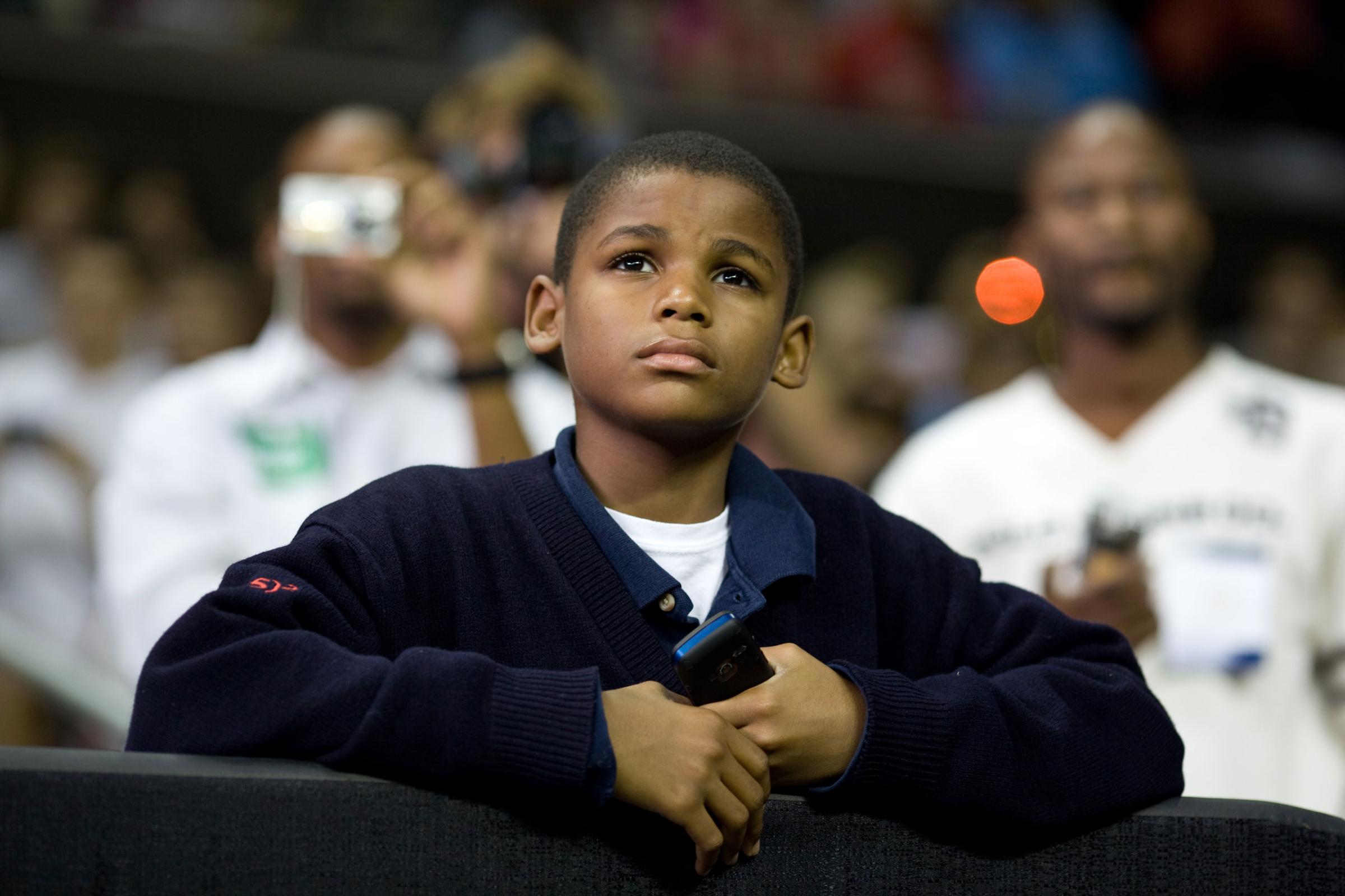 “I was struck by the young boy’s look as he watched the President speak at a health care reform rally at the University of Maryland in College Park,”Sept. 17, 2009.
