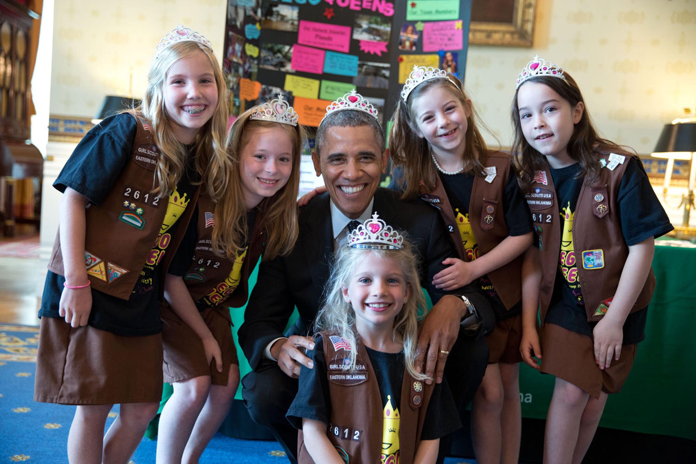 "This photograph was from the annual White House Science Fair. It shows the President posing with Girl Scout Troop 2612 from Tulsa, Oklahoma. I think the 8-year-old girls — Avery Dodson, Natalie Hurley, Miriam Schaffer, Claibyre Winton and Lucy Claire Sharp — are called 'Brownies.' They had just shown the President their exhibit: a Lego flood-proof bridge project. The fair celebrated the student winners of a broad range of science, technology, engineering, and math (STEM) competitions from across the country, May 24, 2014.