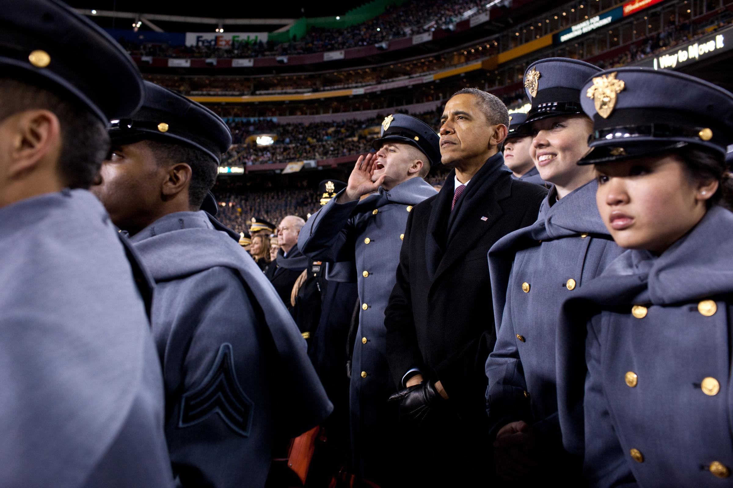 "Attending the annual Army vs. Navy football game at FedEx Field outside Washington, the President spent part of the first half watching the game with Midshipmen from the Naval Academy. During the second half, he crossed the field and watched with Cadets from the U.S. Military Academy (pictured here), Dec. 10, 2011.