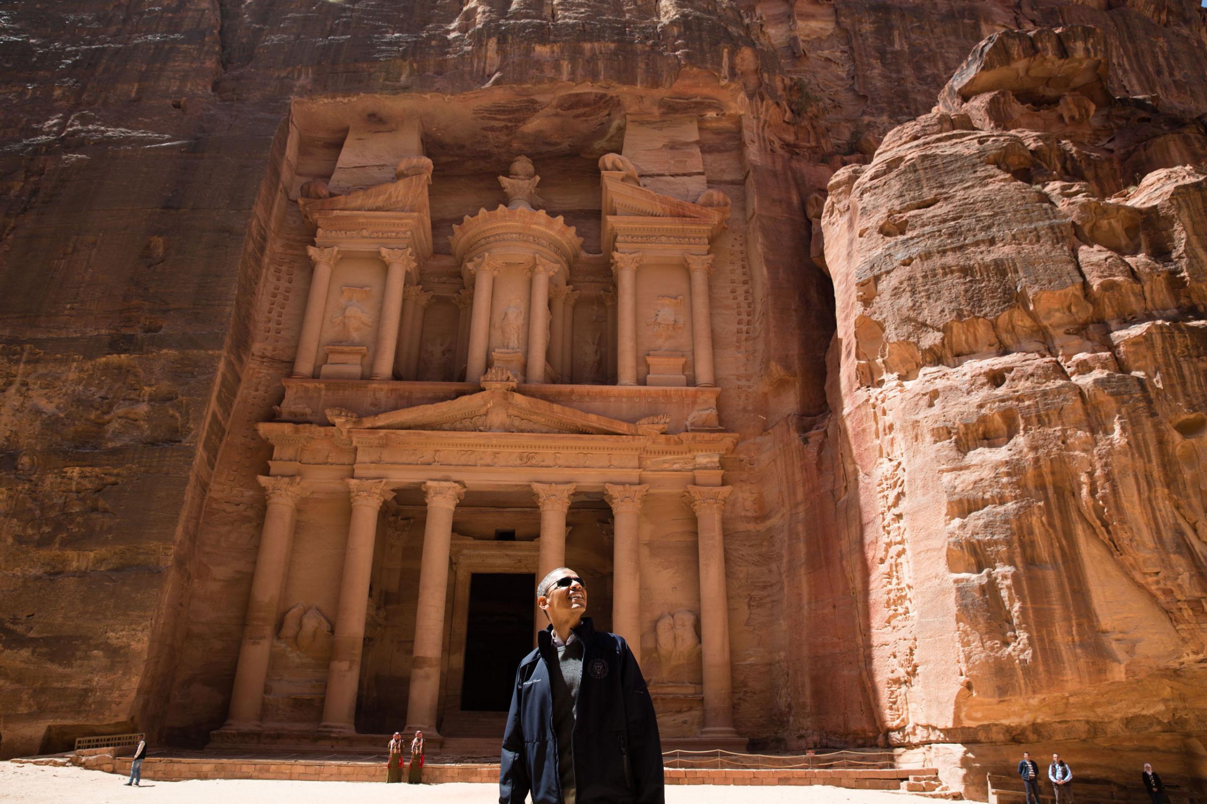 President Barack Obama views the area near the Treasury during a walking tour of the ancient city of Petra in Jordan, March 23, 2013.