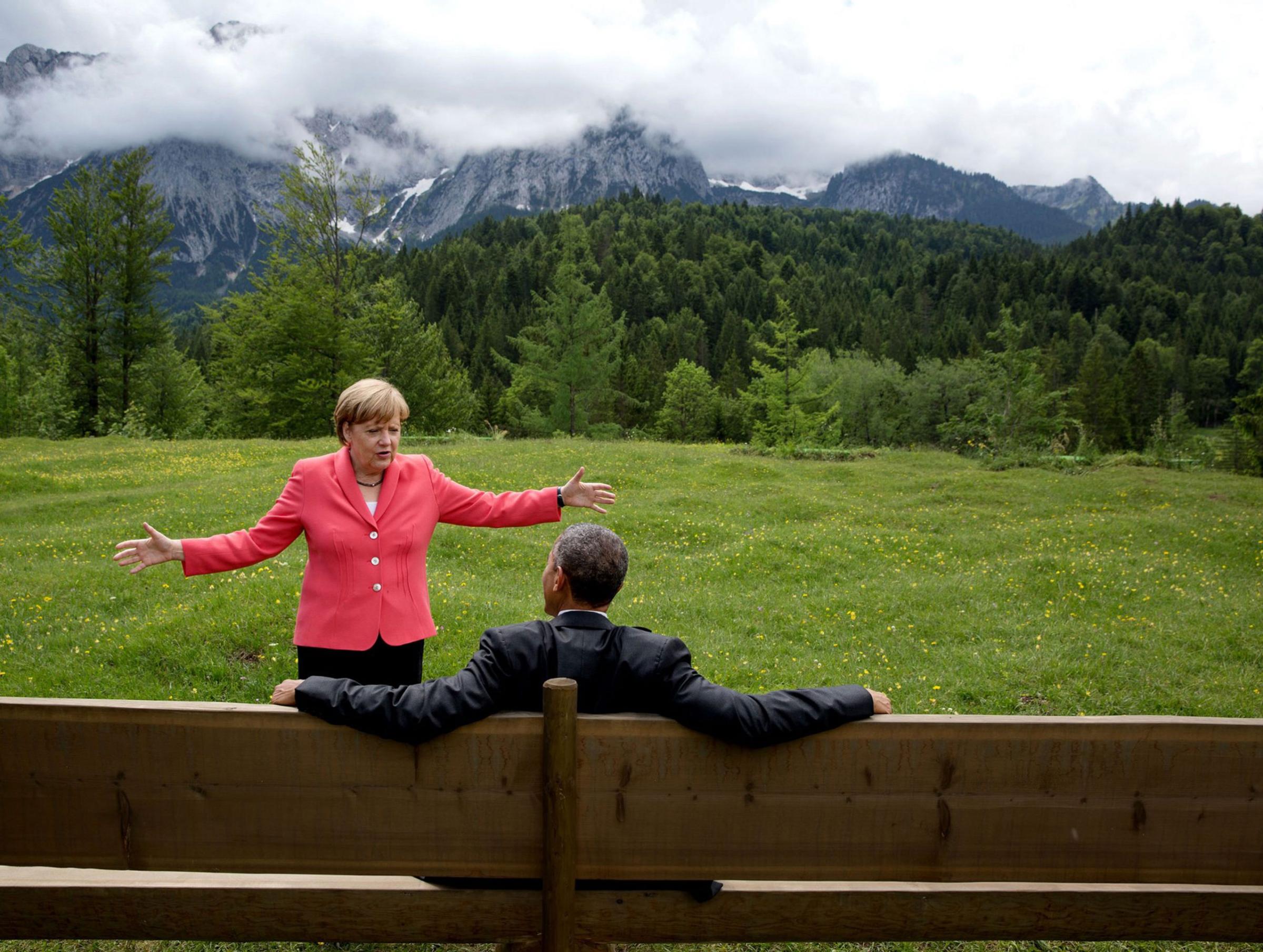 "We were at the G7 Summit in Krün, Germany. Chancellor Angela Merkel asked the leaders and outreach guests to make their way to a bench for a group photograph. The President happened to sit down first, followed closely by the Chancellor. I only had time to make a couple of frames before the background was cluttered with other people," June 8, 2015.