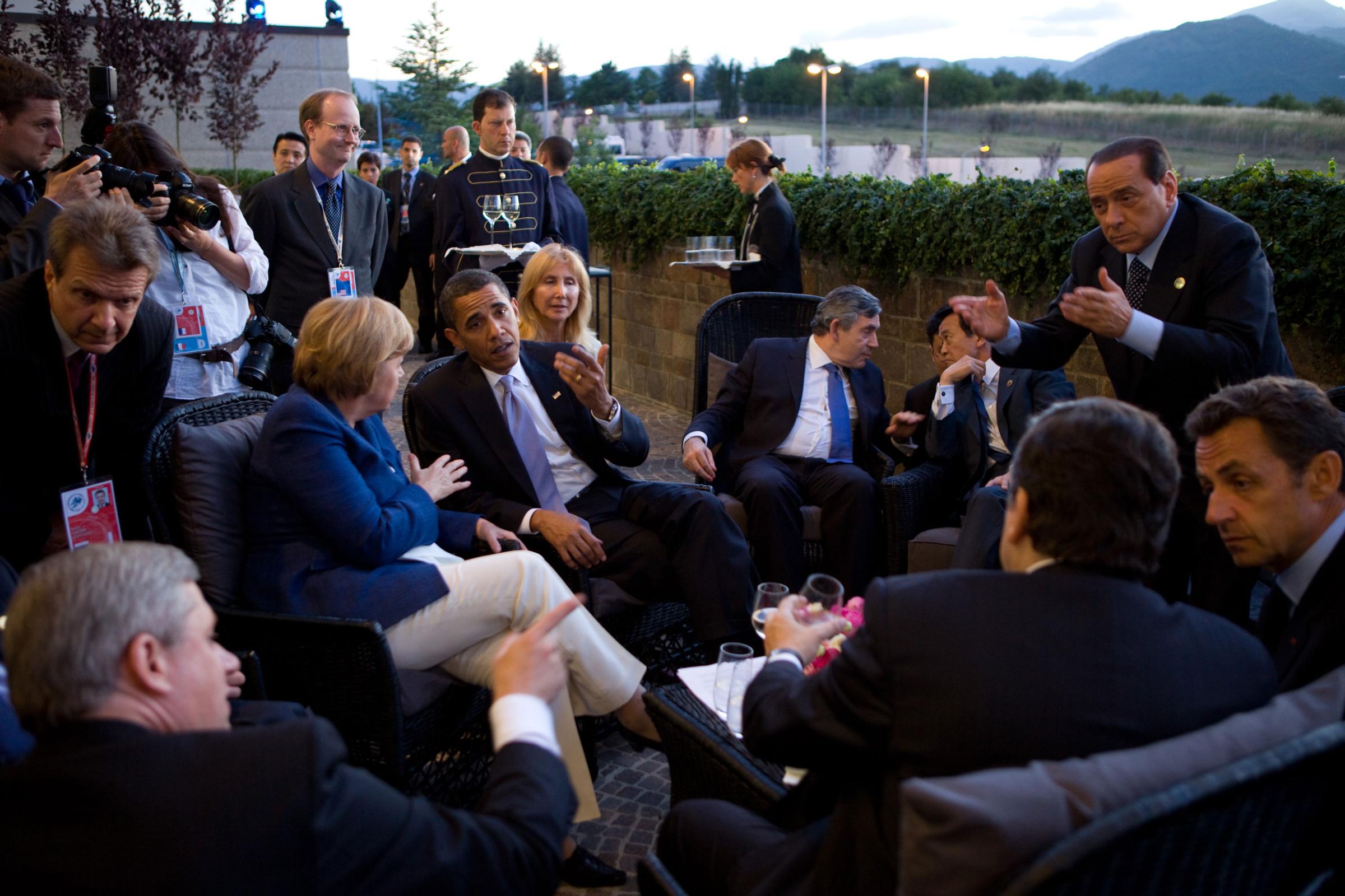“This was a great scene just before dinner at the G-8 Summit in L’Aquila, Italy. As the leaders arrived, they spontaneously moved to a small patio outside. Several different conversations were taking place. Finally as dusk settled in, Italian Prime Minister Silvio Berlusconi, at far right, motioned for everyone to move inside for the dinner,”July 8, 2009.