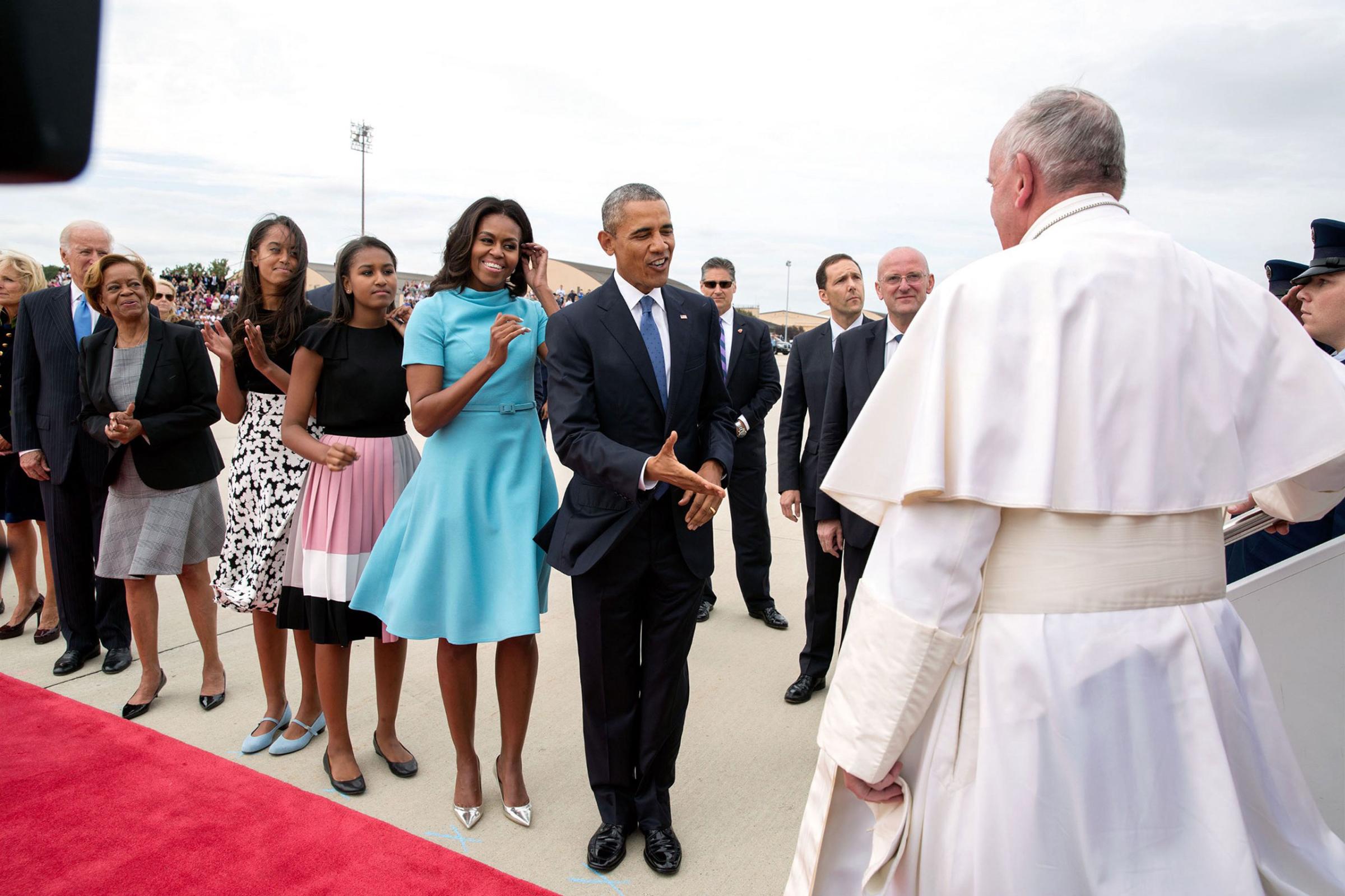 "The Obama family and Biden family greet Pope Francis as he arrives in the United States for the first time at Joint Base Andrews," Sept. 22, 2015.