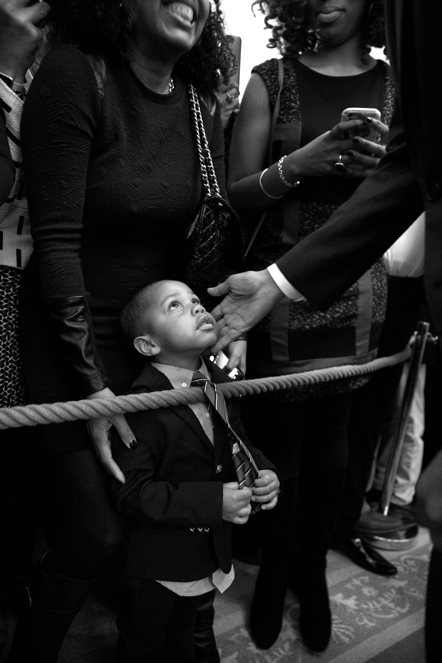 President Barack Obama greets Clark Reynolds, 3, during a reception celebrating African American History Month in the East Room of the White House, Feb. 18, 2016.