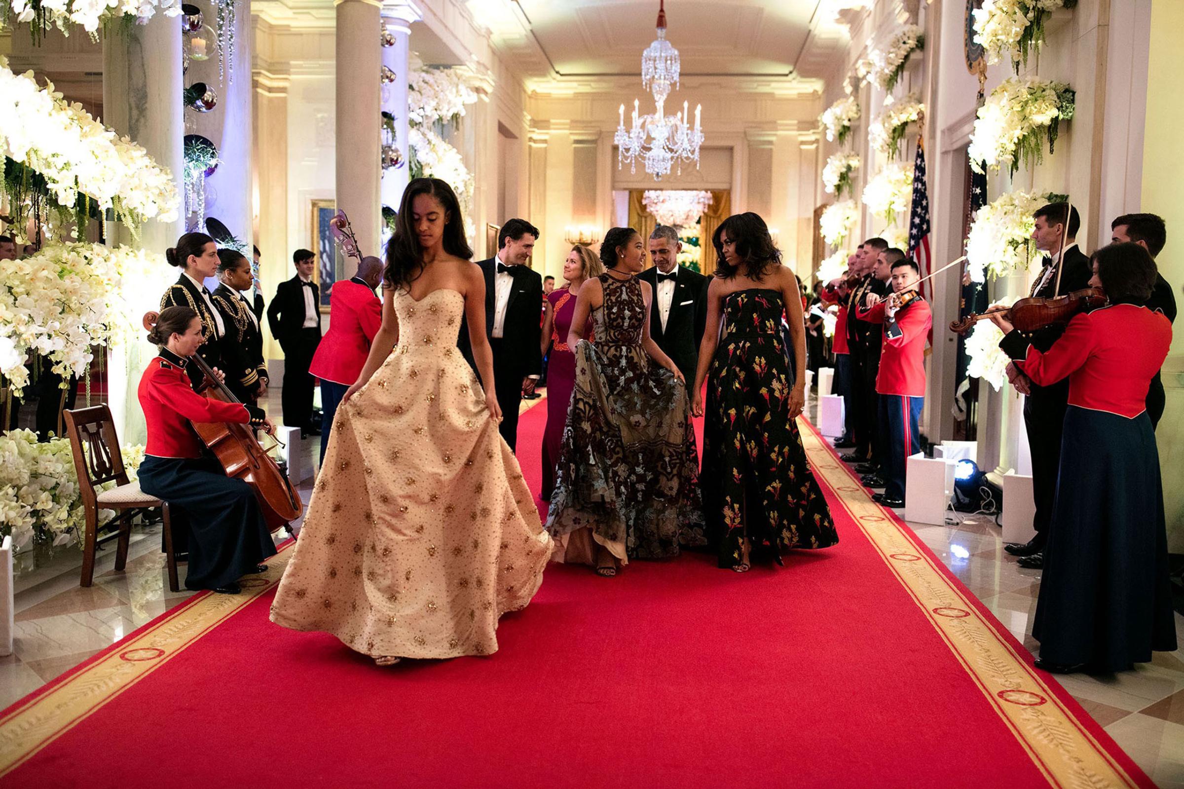 “What an honor to watch these girls grow up. Malia, foreground, and Sasha were both invited guests for the State Dinner in honor of Prime Minister Justin Trudeau of Canada and Mrs. Sophie Grégoire-Trudeau. Following the actual sit-down dinner in the East Room, they made their way down the Great Hall to the State Dining Room for the musical entertainment.” March 10, 2016