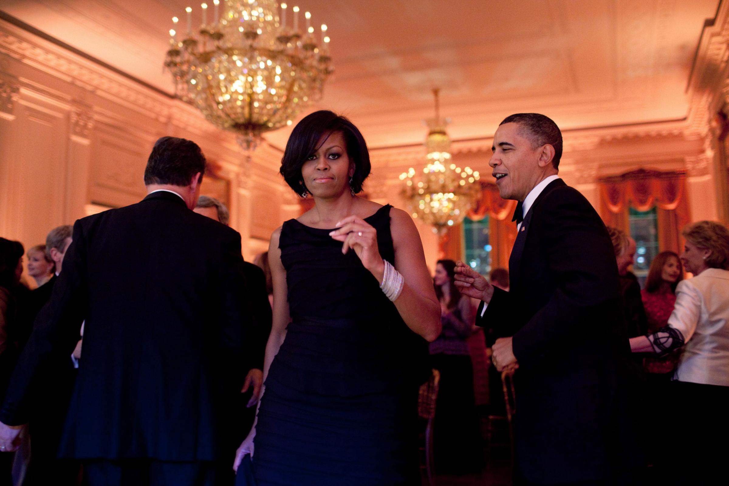 "The President and First Lady were dancing along to the music of the Harry Connick, Jr., Big Band at the Governors Ball. Mrs. Obama turned towards me and, for one split second, looked right at me. Usually I strive to capture moments when the subjects are unaware of the camera. But this an exception where I actually liked that she was looking at me, Feb. 21, 2010. "